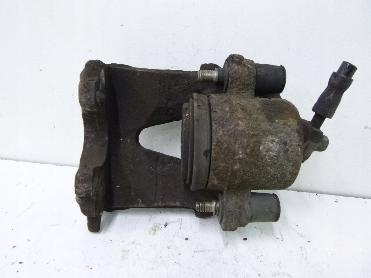 caliper brake front Volkswagen Golf IV 1.4 00r.