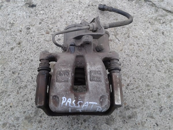 ZACISK LEWY TYLNY TYL VW PASSAT B6 2 0 TDI