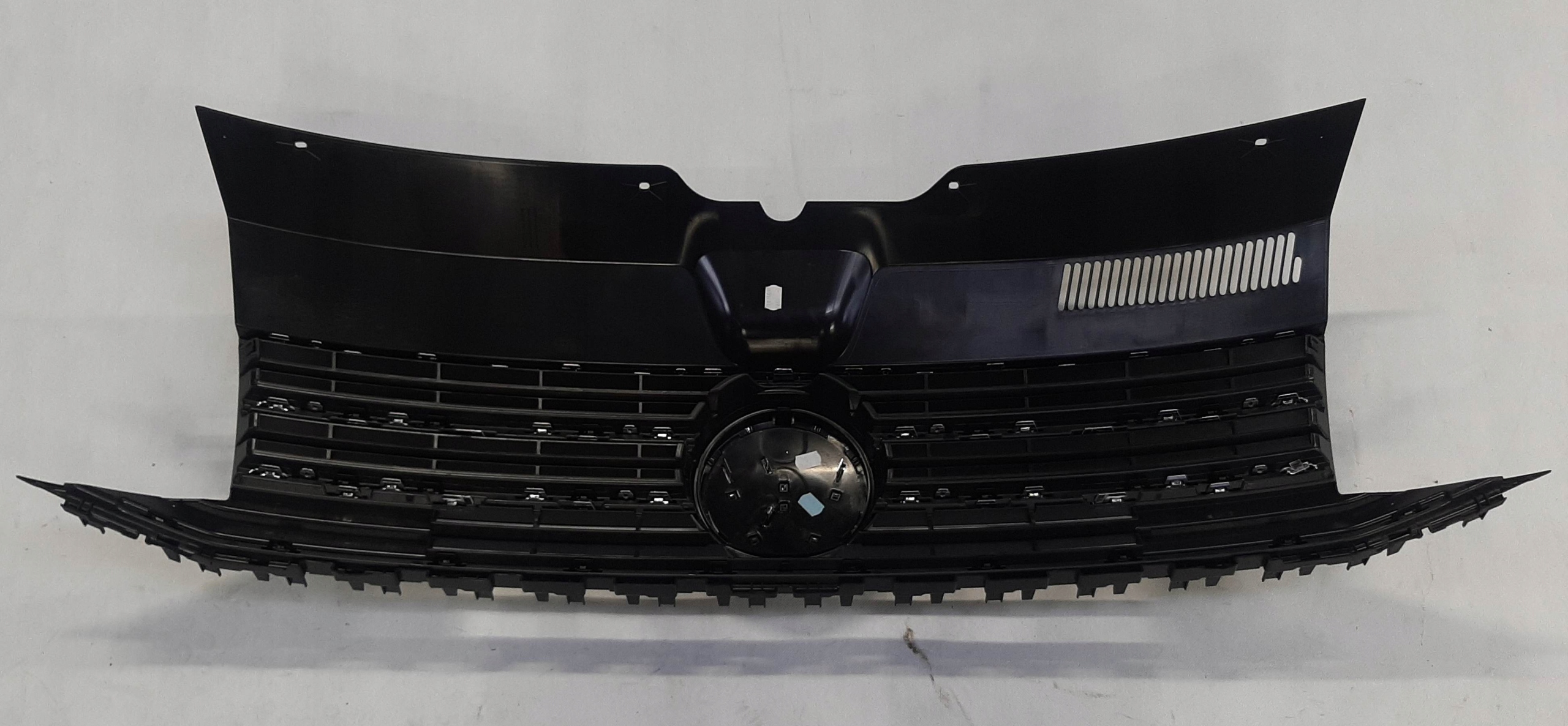 VW T6 Multivan Caravelle Grill Atrapa NOWA 7E5853651C oryginał emblemat Kolor czarny