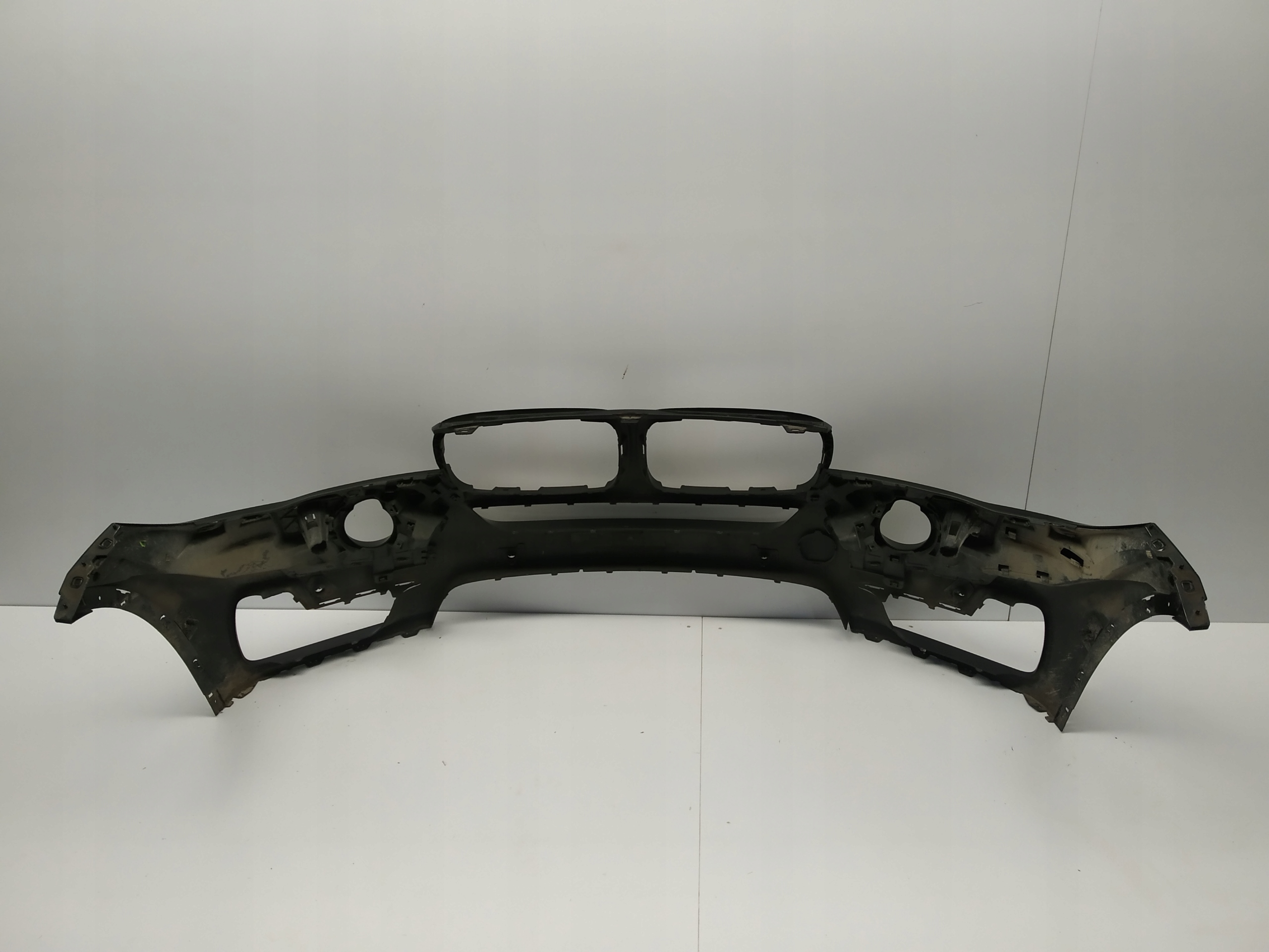2013r- Bmw X5 F15 bumper front below 6xPdc and washers 7294480 ciemny