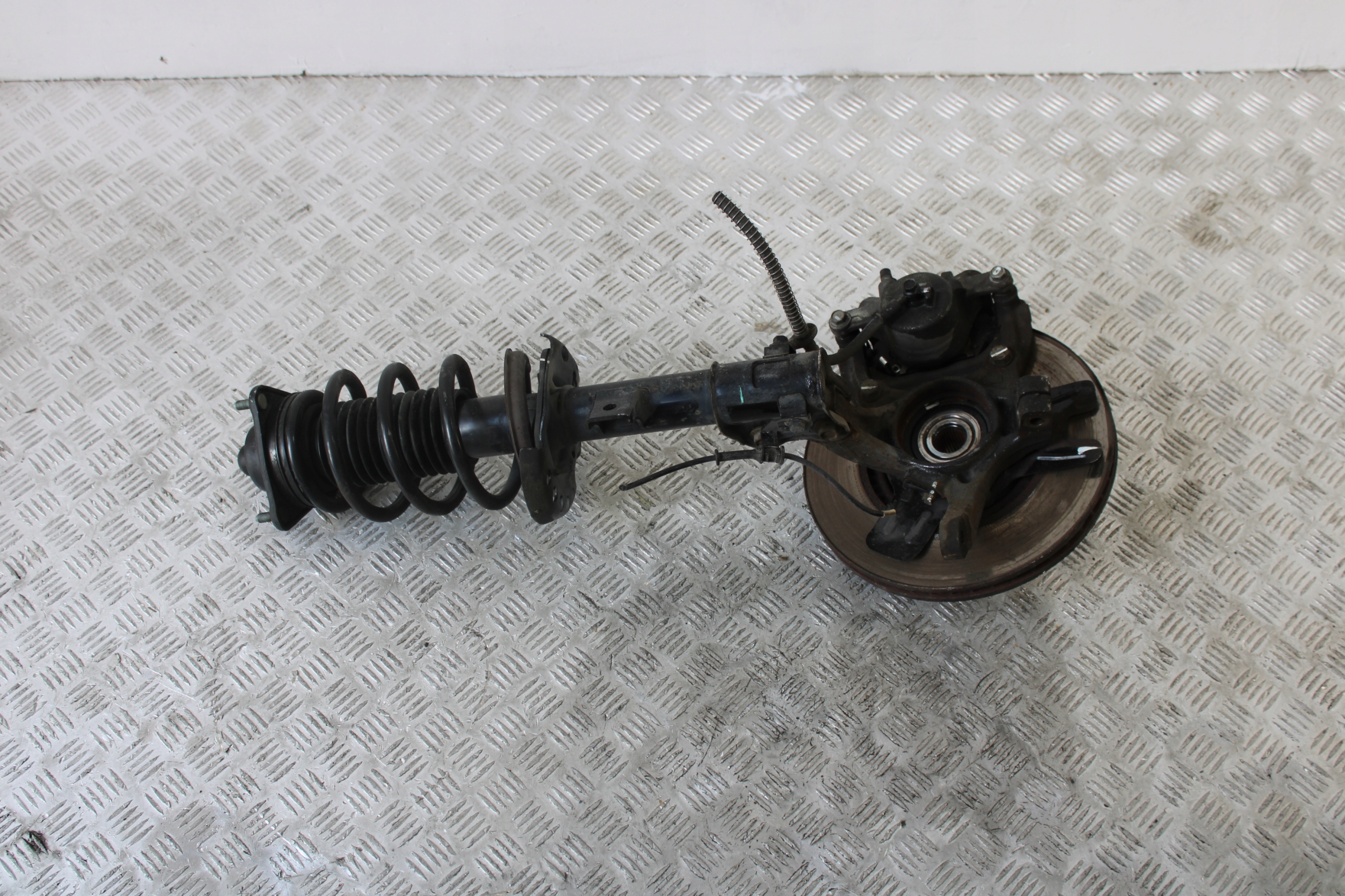 swing McPherson shock absorber left front KIA CARENS IV 4