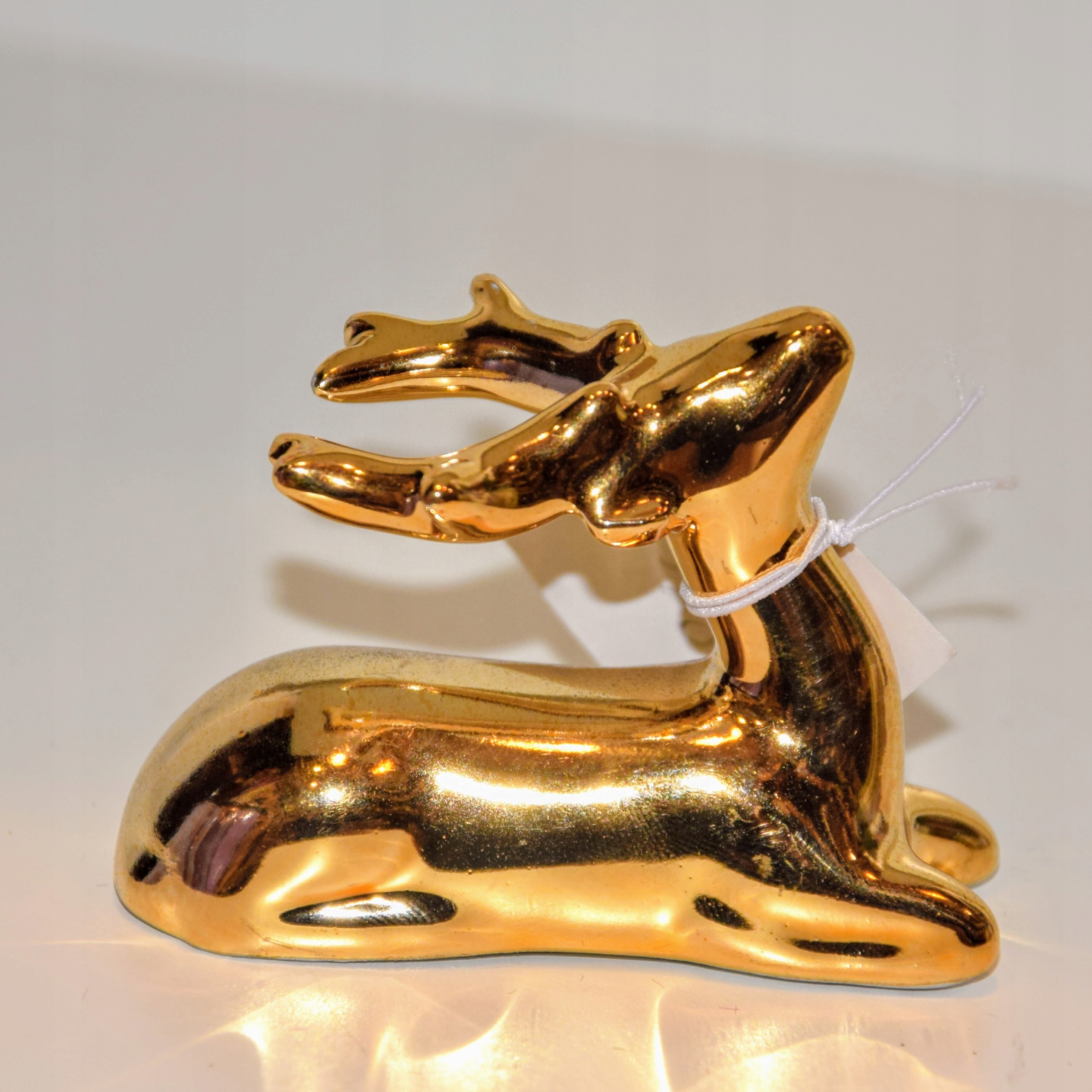 CERAMICZNY ZŁOTY RENIFEREK 6,6X5,2X5,4 CM OZDOBA Marka Ewax