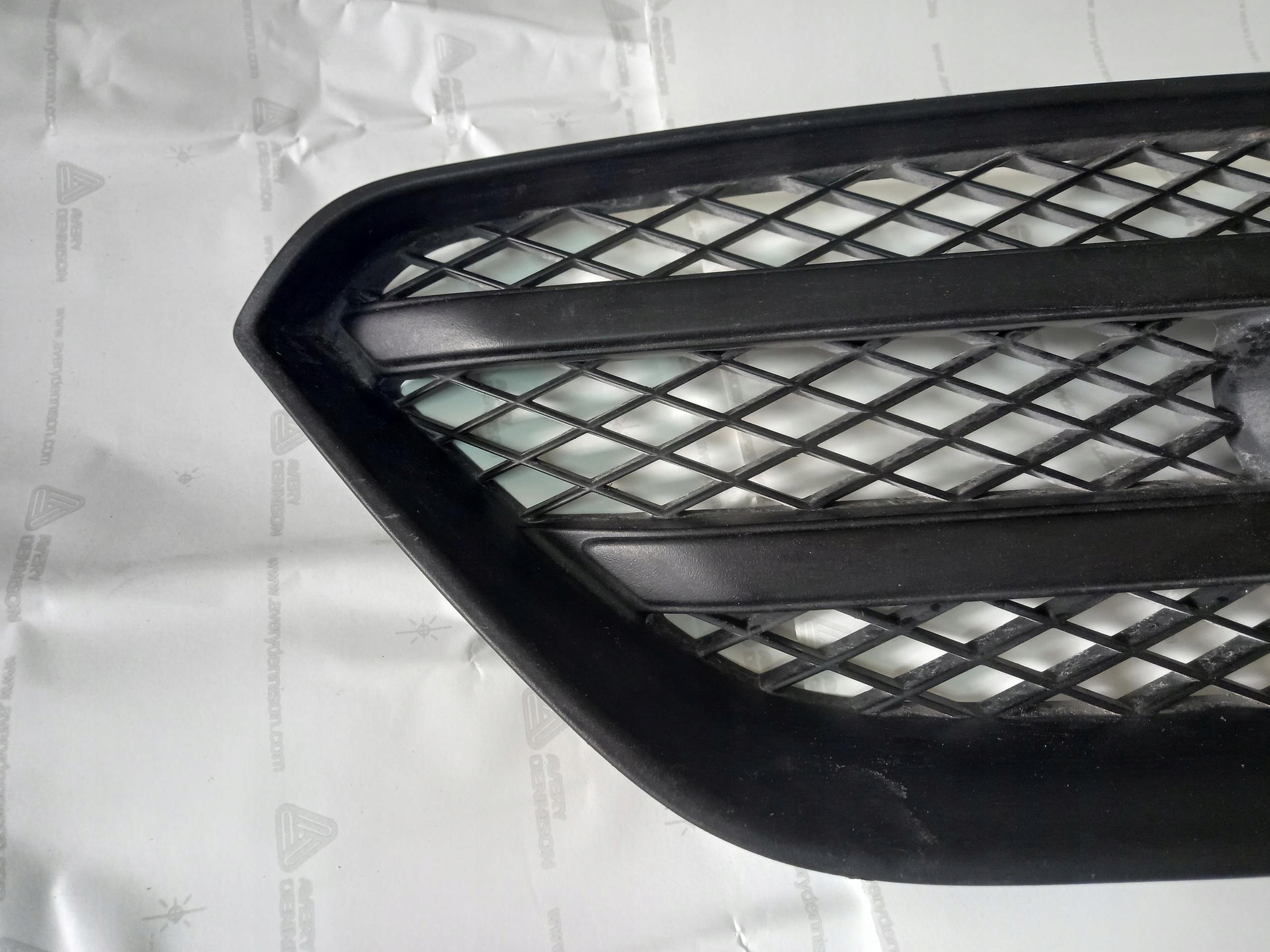 grid of a bumper front central KIA CARENS III