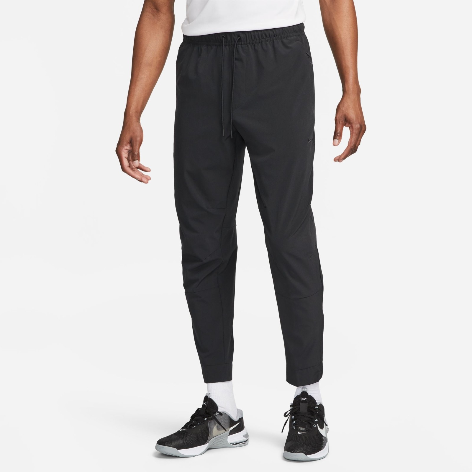 Pánské tepláky Nike Unlimited Mens Dri-FIT Zippered Cuff Versatile Pants