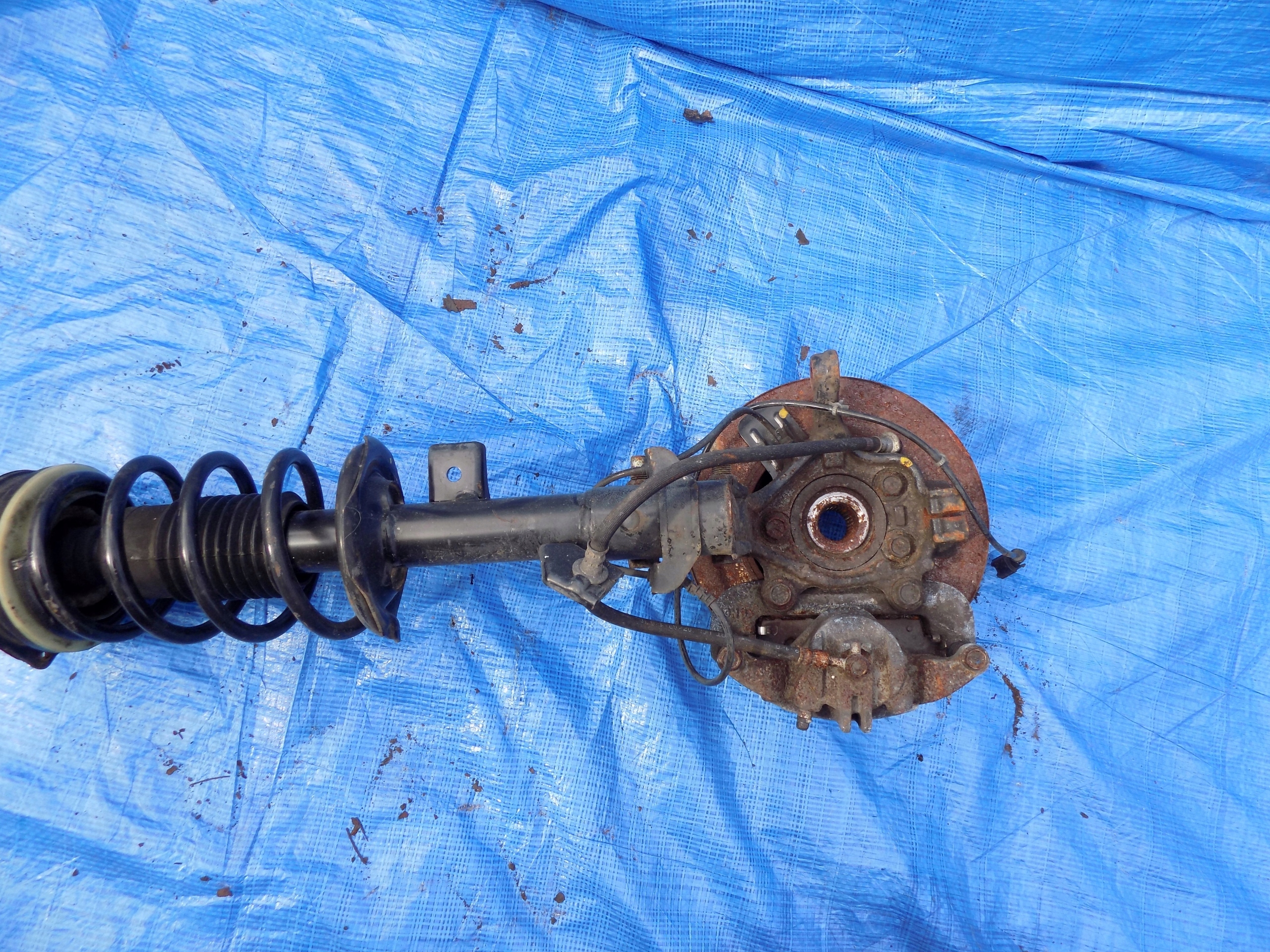 swing right front shock absorber NISSAN NV200 1,5