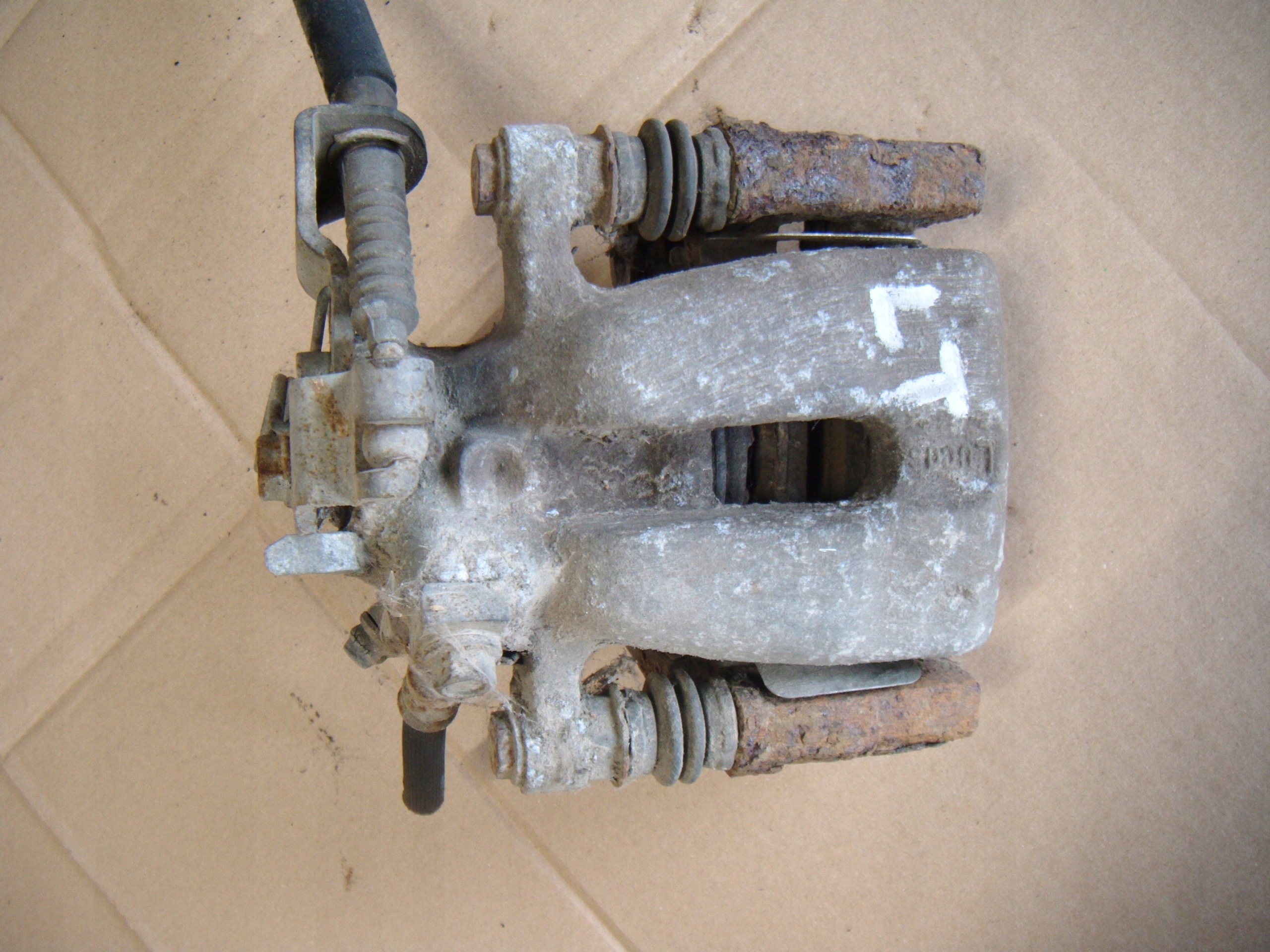 OPEL MERIVA A 03-10 1.4 ZACISK HAMULCOWY LEWY TYŁ