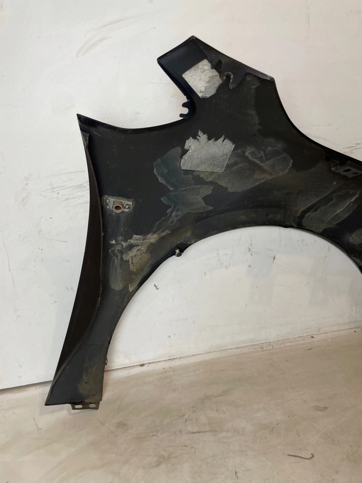 fender front front left Opel Astra IV J black