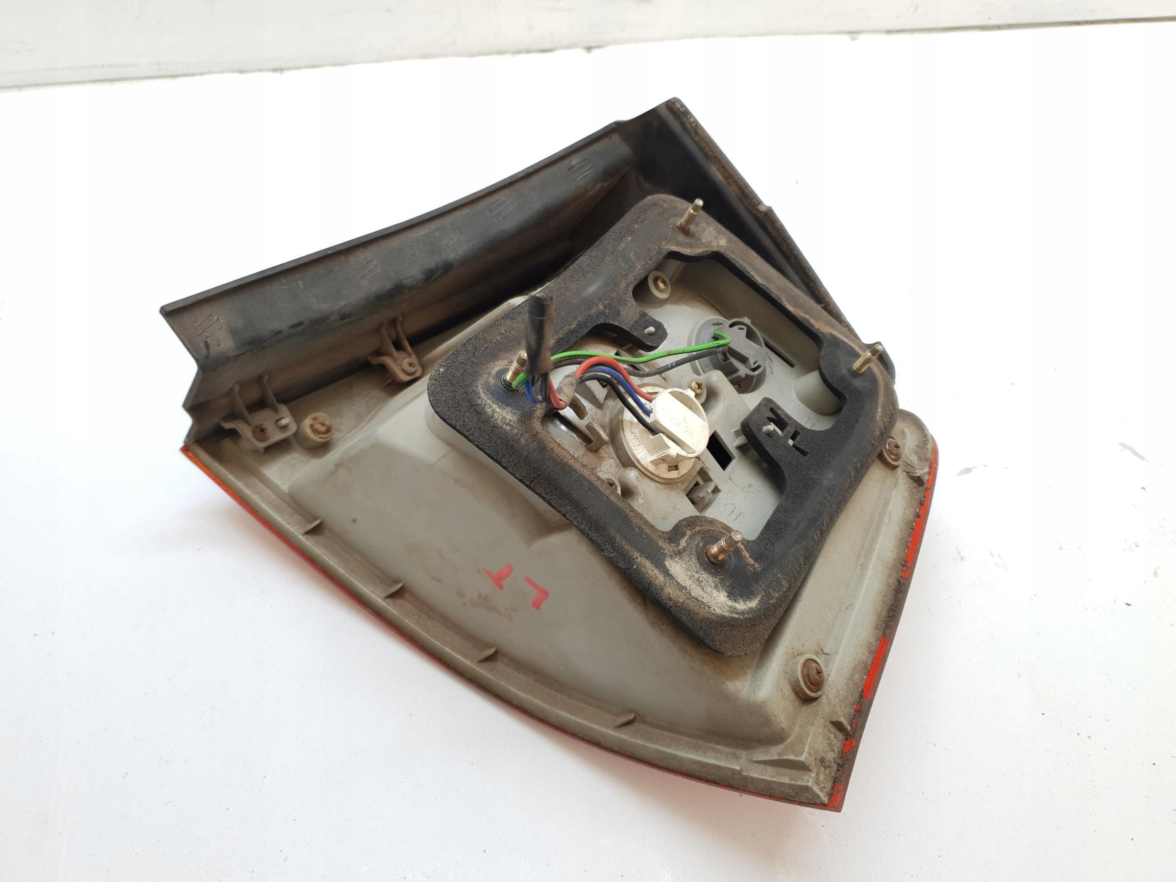 фонарь левый kia CARENS II