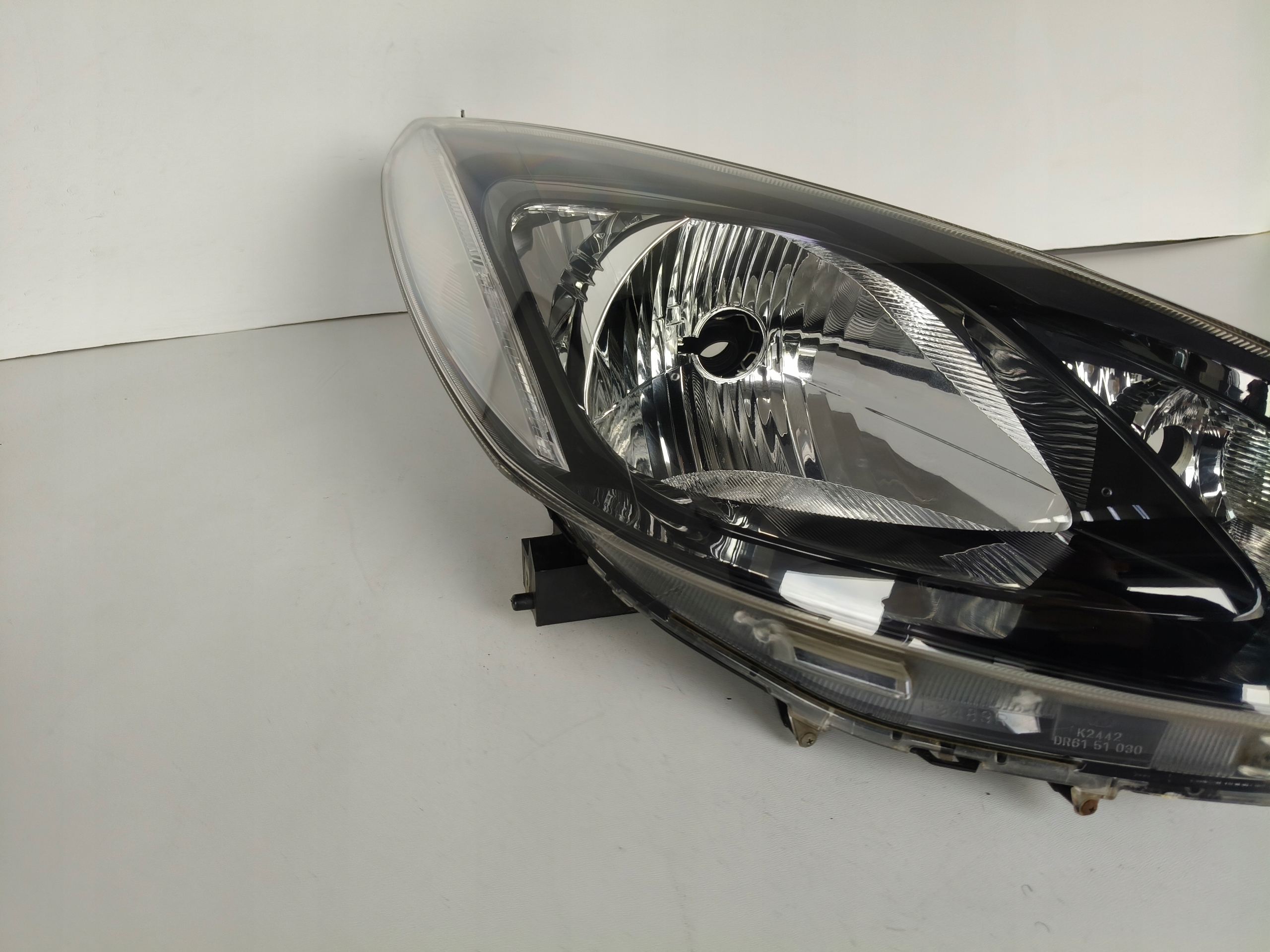 light right REFLEKTOR MAZDA 2 07