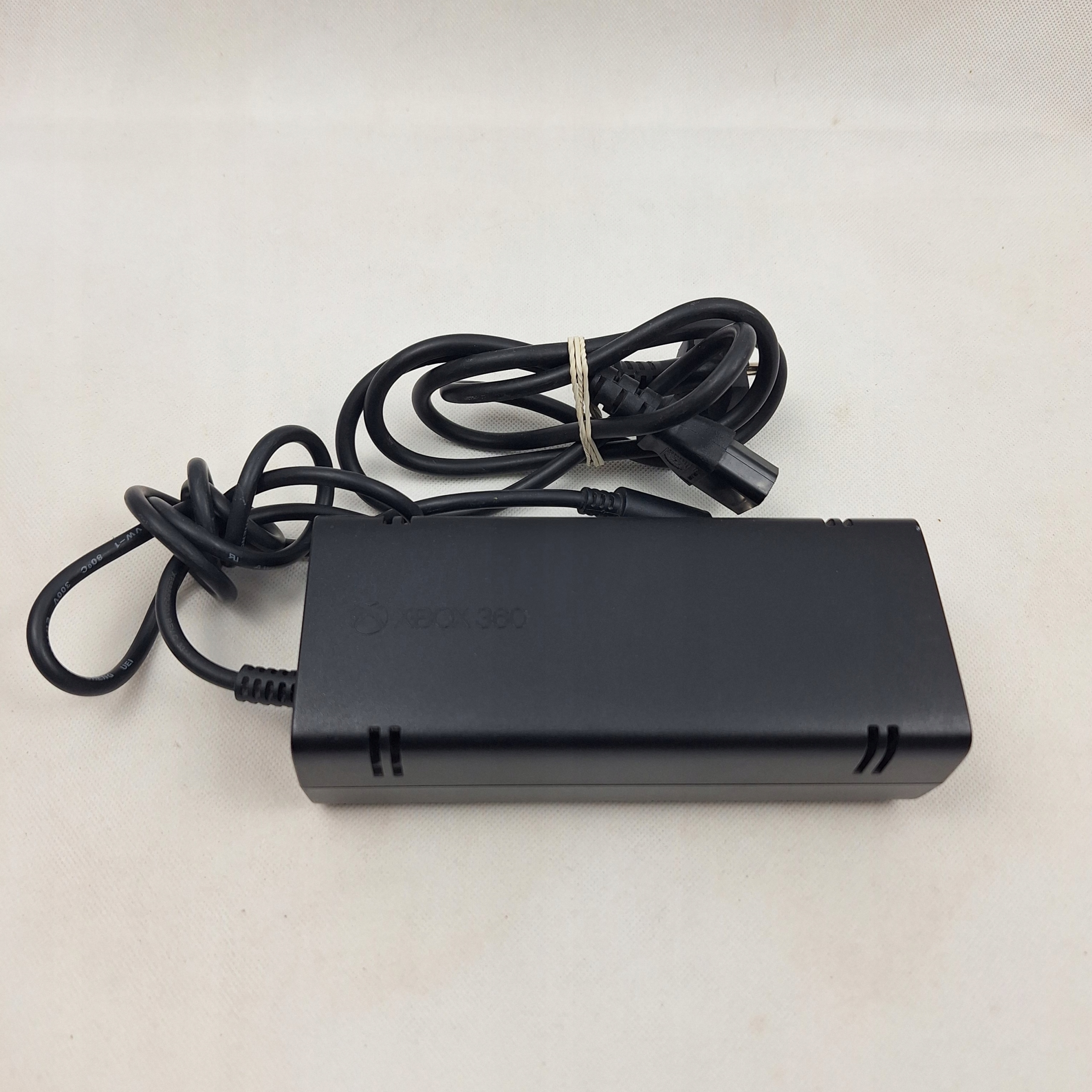 ORYGINALNY ZASILACZ DO KONSOLI XBOX 360 SLIM E 100% ORYGINAŁ + KABEL ZESTAW Stan opakowania zastępcze