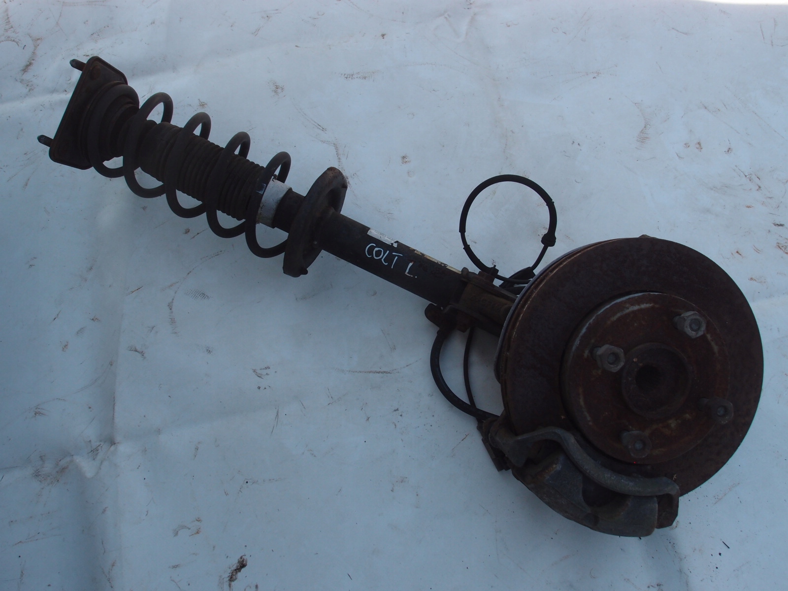 MCPERSON AMORTYZATOR LEWY MITSUBISHI COLT 12r