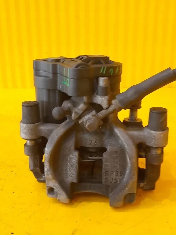 11628210023 - VW Golf VII гальмівний супорт правий задній 5q0615406