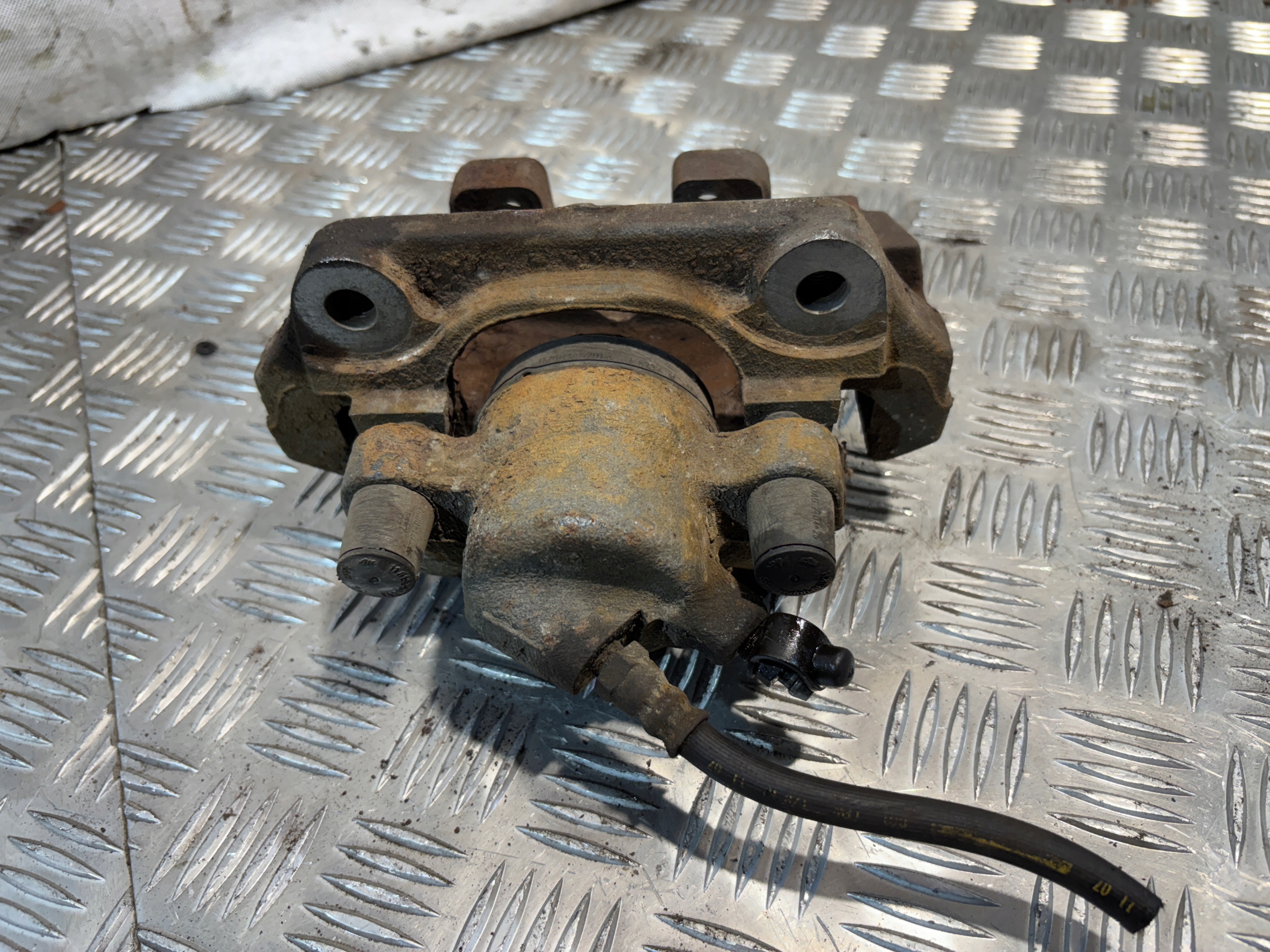 caliper brake right front BMW E91 lift 2,0B N43B20A