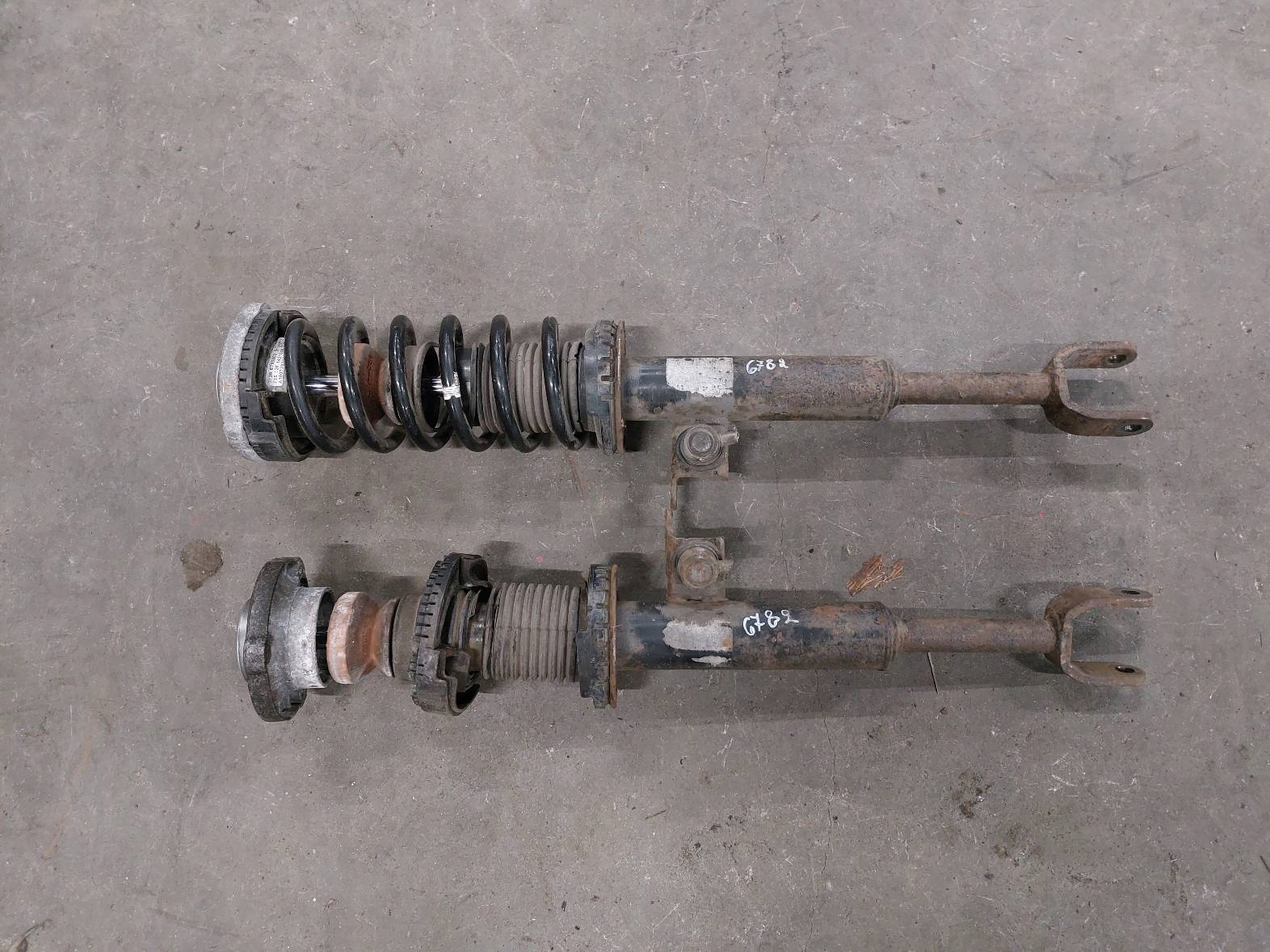 shock absorber + spring left front + right front BMW F10 520d