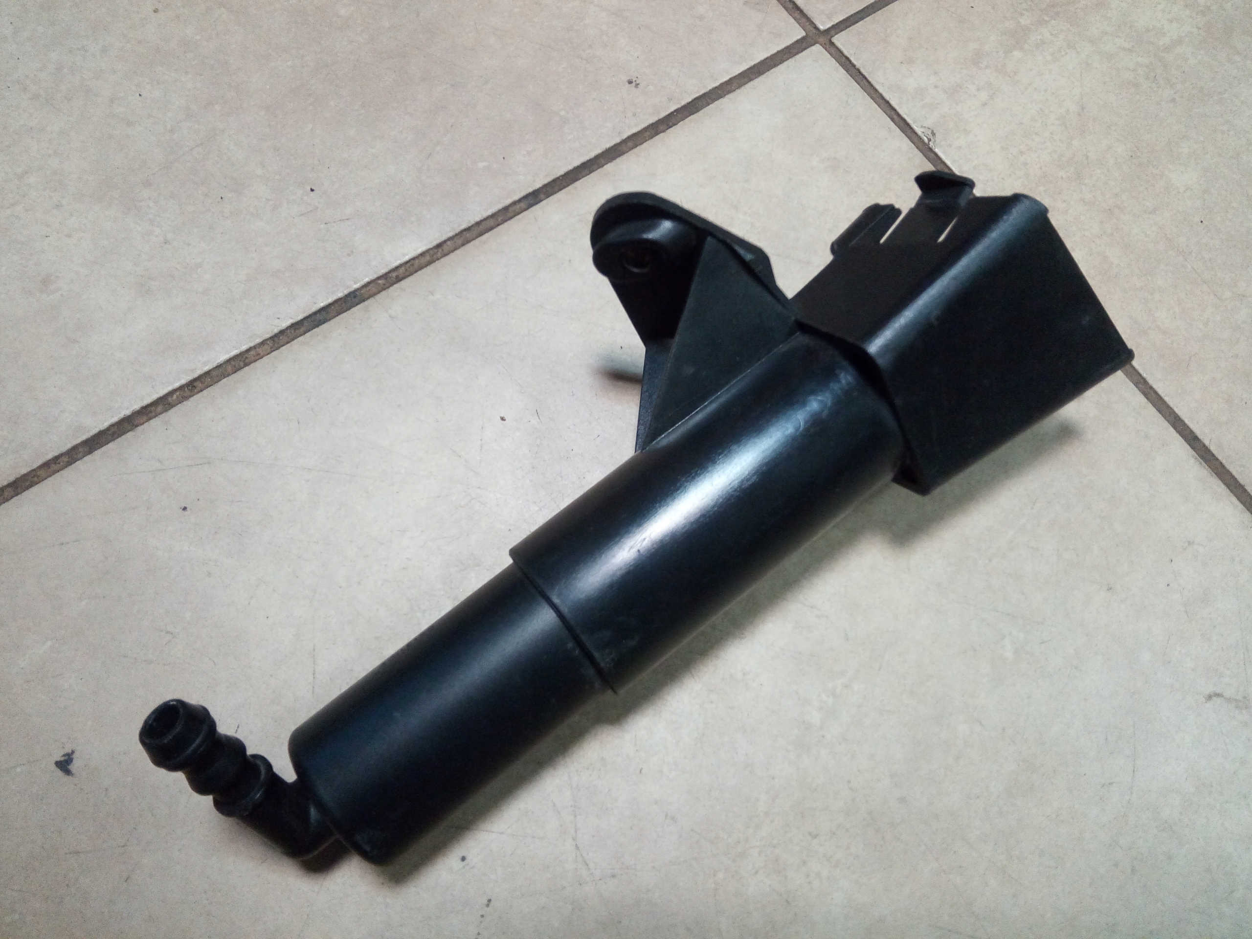 30875 - Омыватель фар TOYOTA AVENSIS T25 orig.*