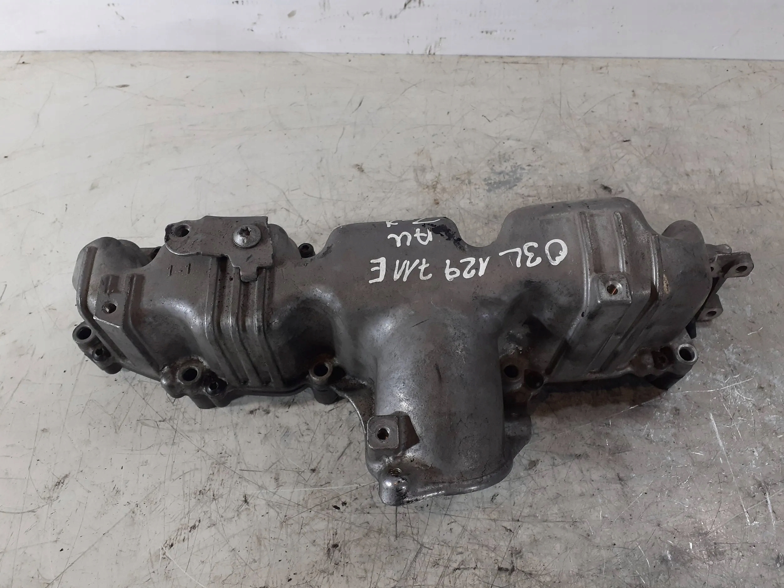 intake manifold 03L129711E Audi 05