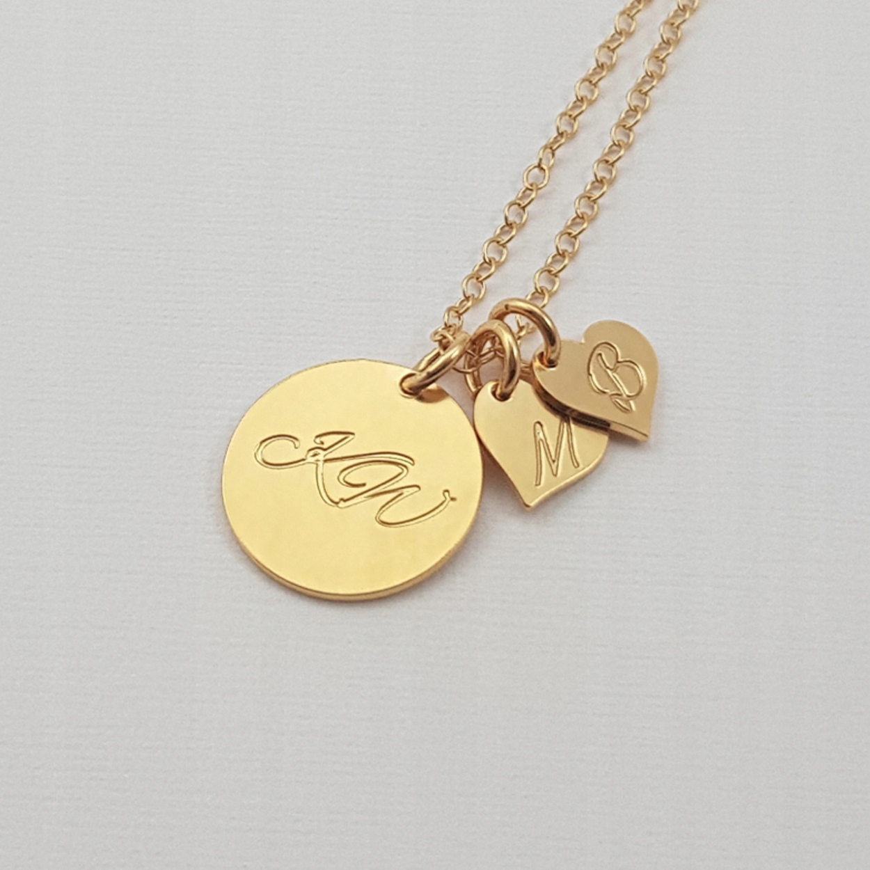 

Złoty naszyjnik dla mamy inicjały dzieci 3 serca
