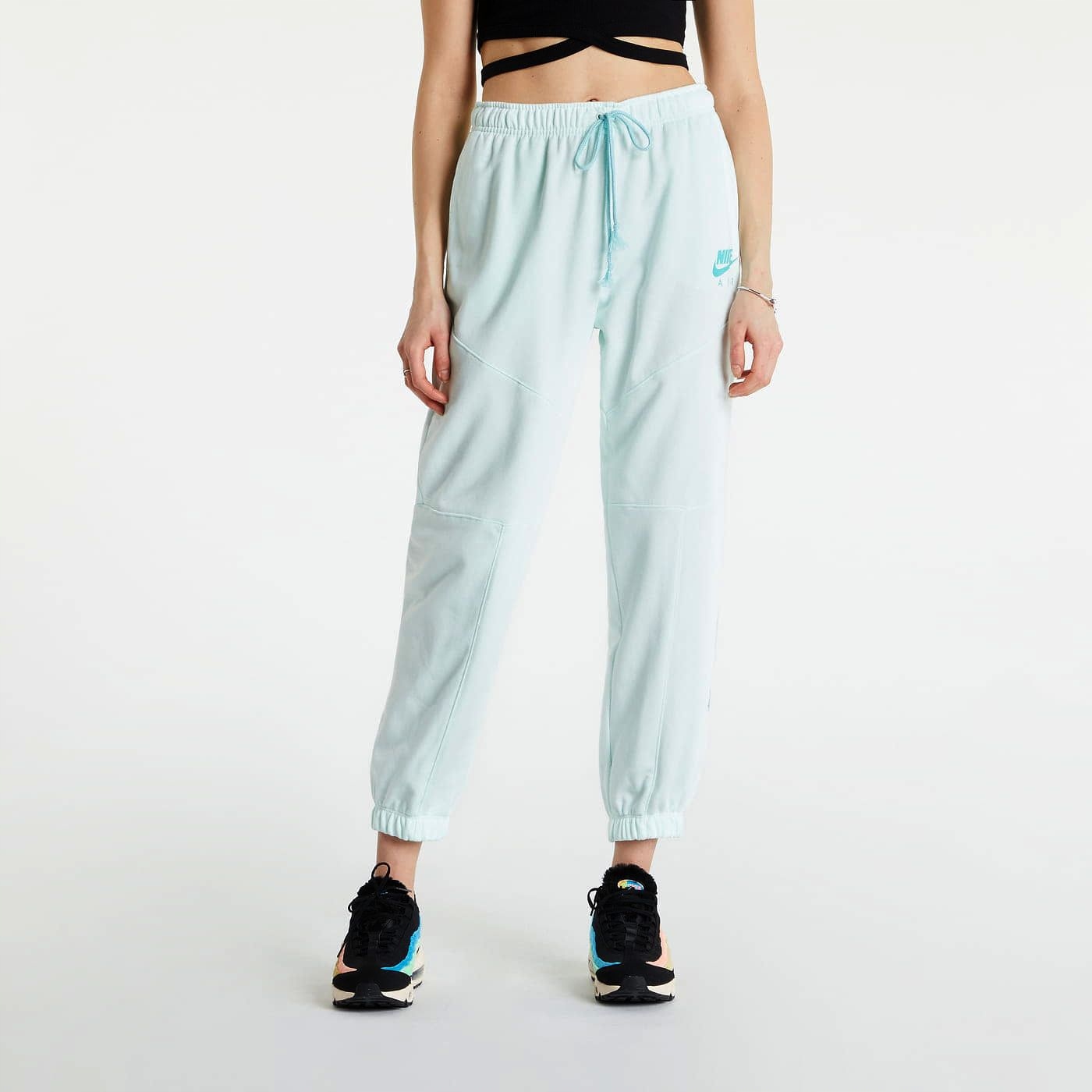 Y9159 Dámské kalhoty Nike Air Flc Loose Fit Mid Rise DM6061-394 S