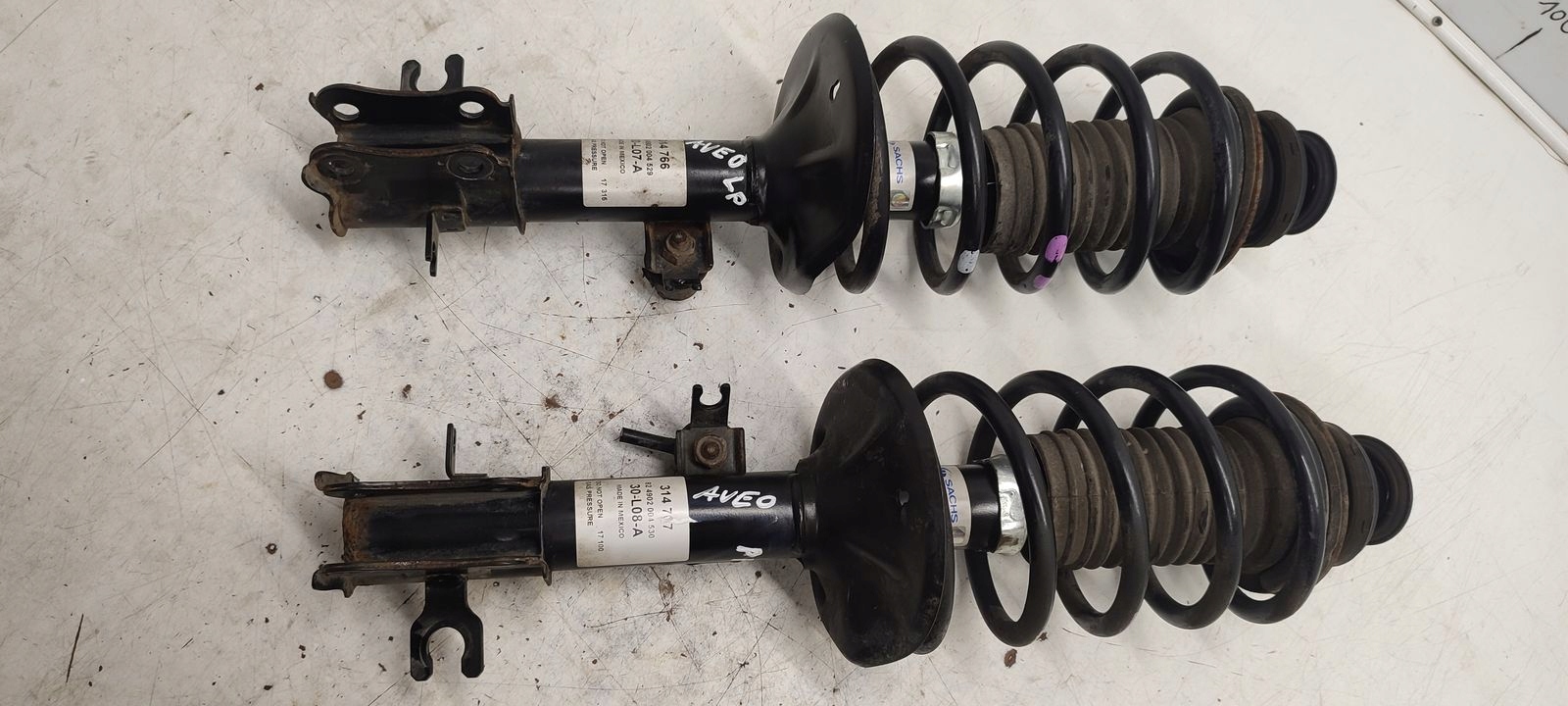 shock absorber spring front sususpension Chevrolet Aveo 1,4 16V