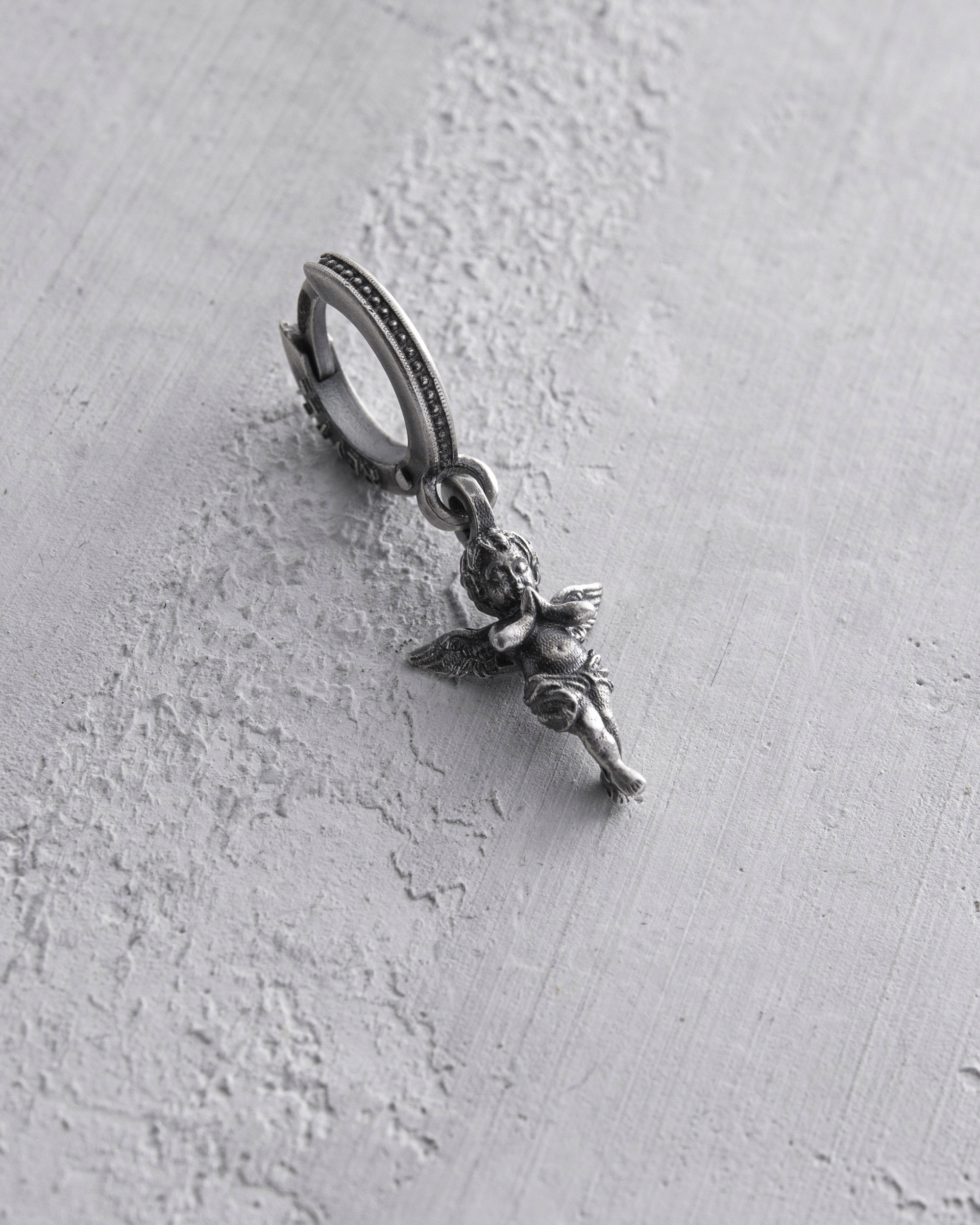 Stříbrný mono náušnice Anděl Světla