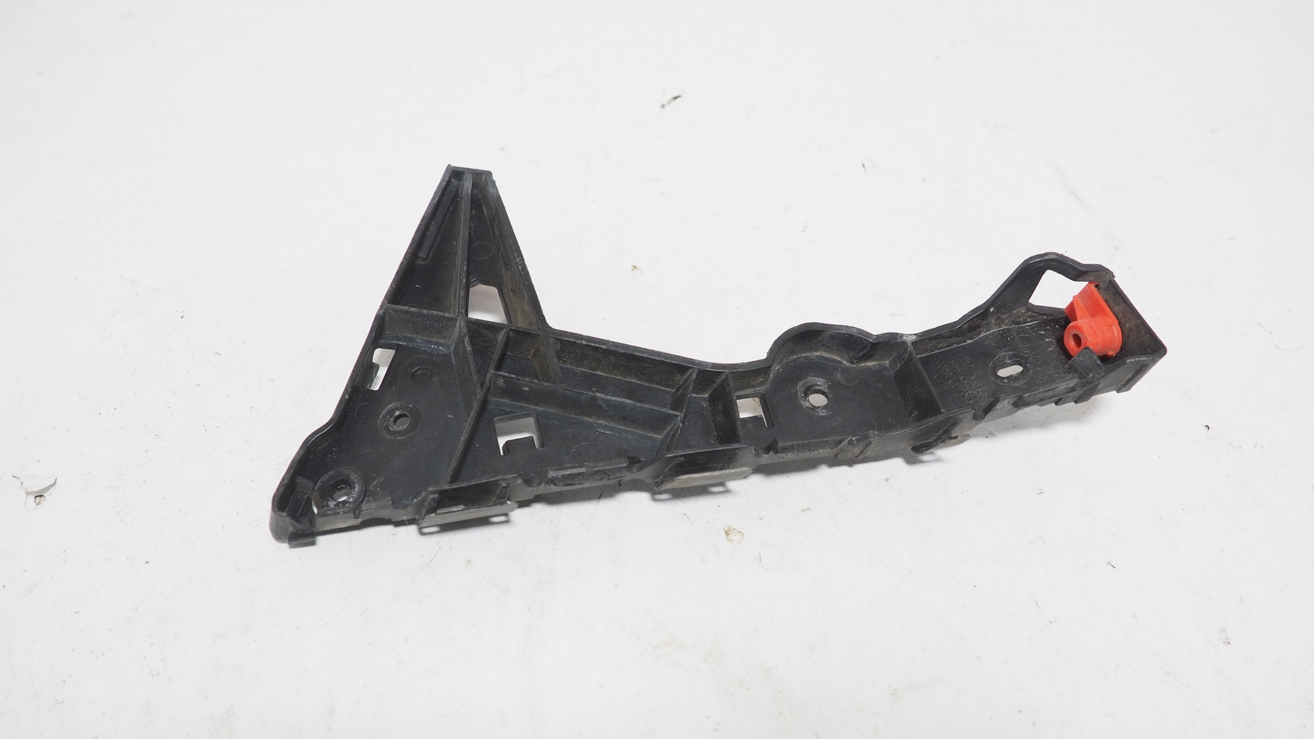 Opel Astra III H bumper bracket right front 24460284