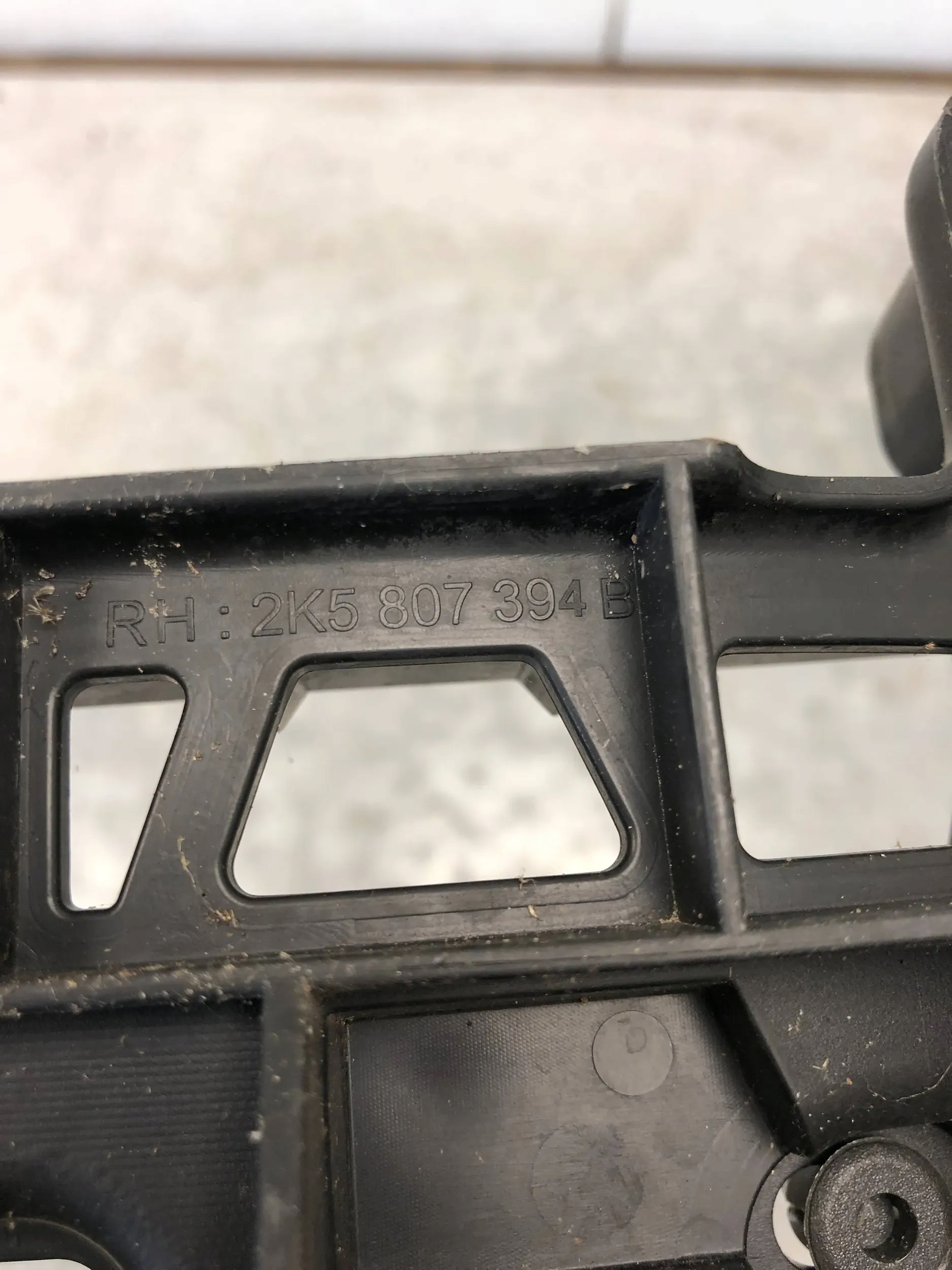bumper bracket right rear part VW CADDY III 2K5807394B