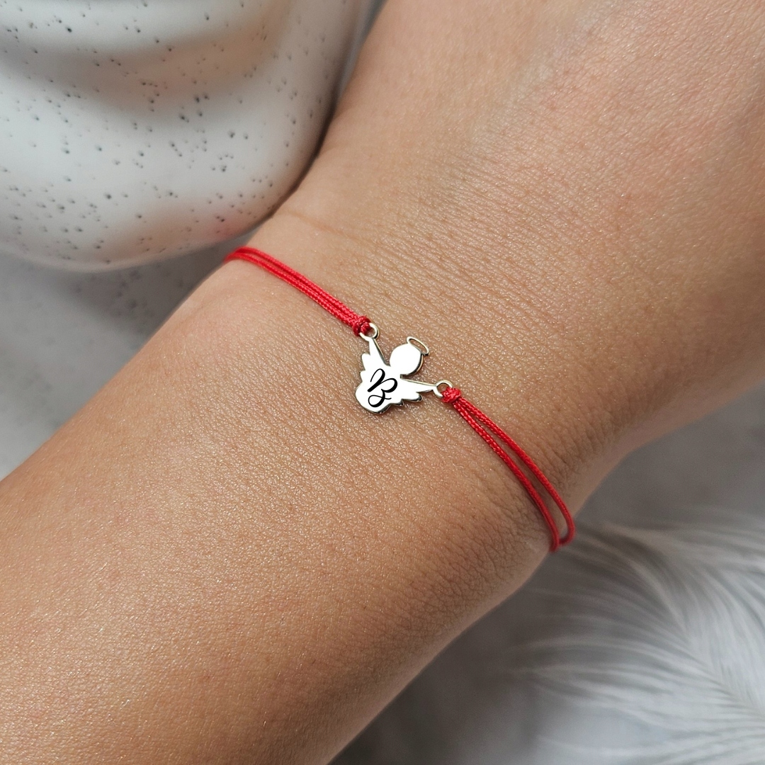 Zlatý náramek na provázku s motivem andílka pr. 585