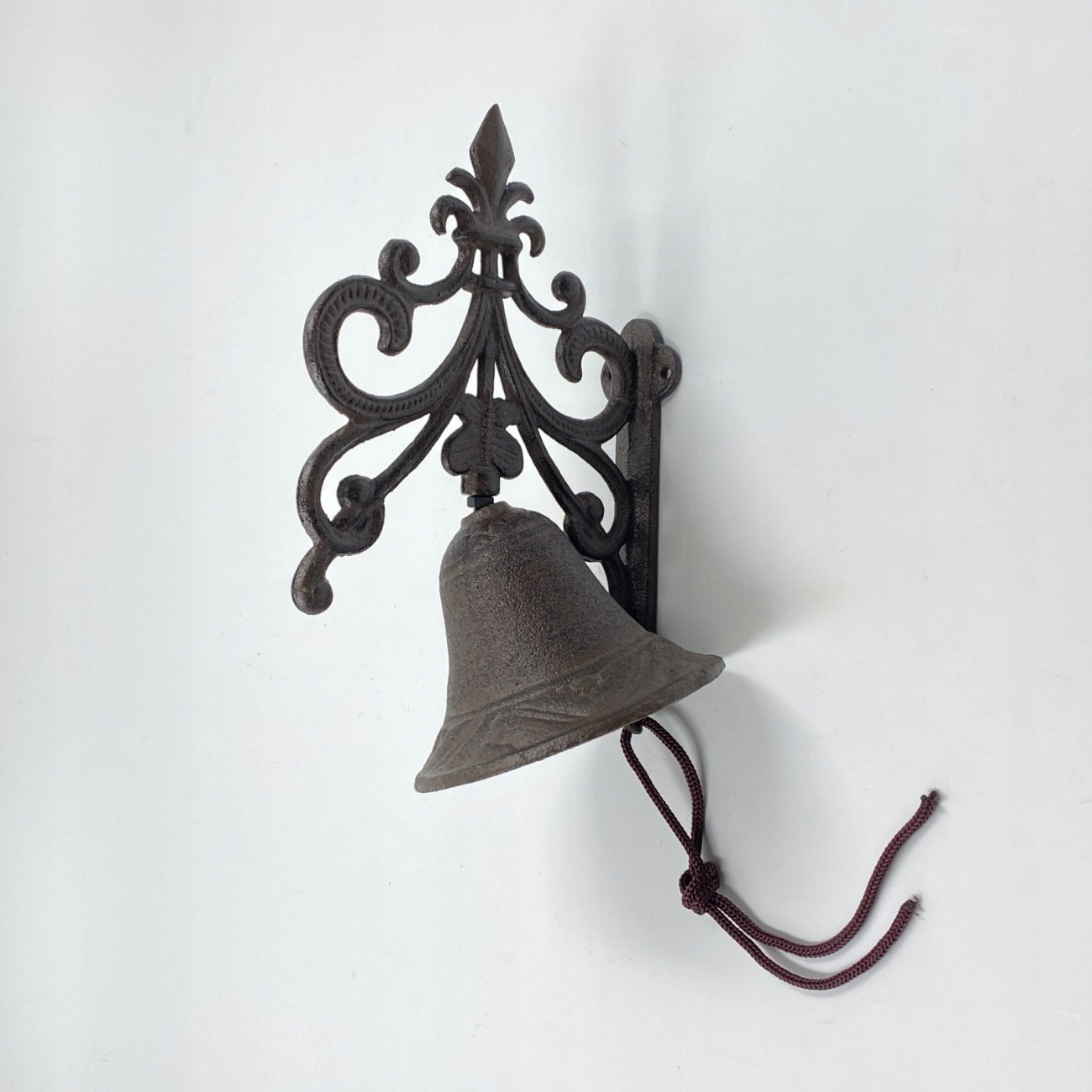 Żeliwny dzwonek ścienny 15x11x40 cm