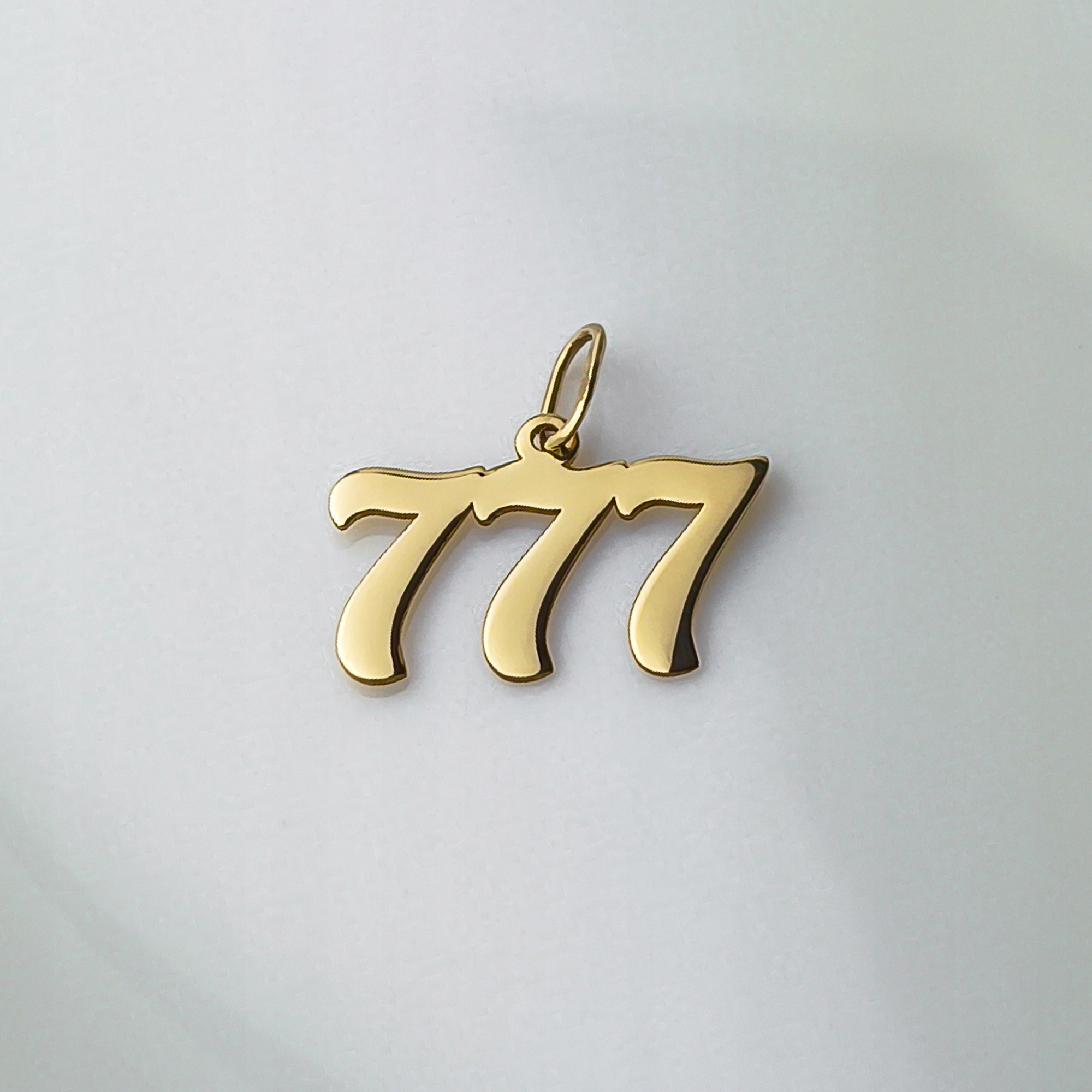 Zlatý přívěsek číslo 777 – pr.585