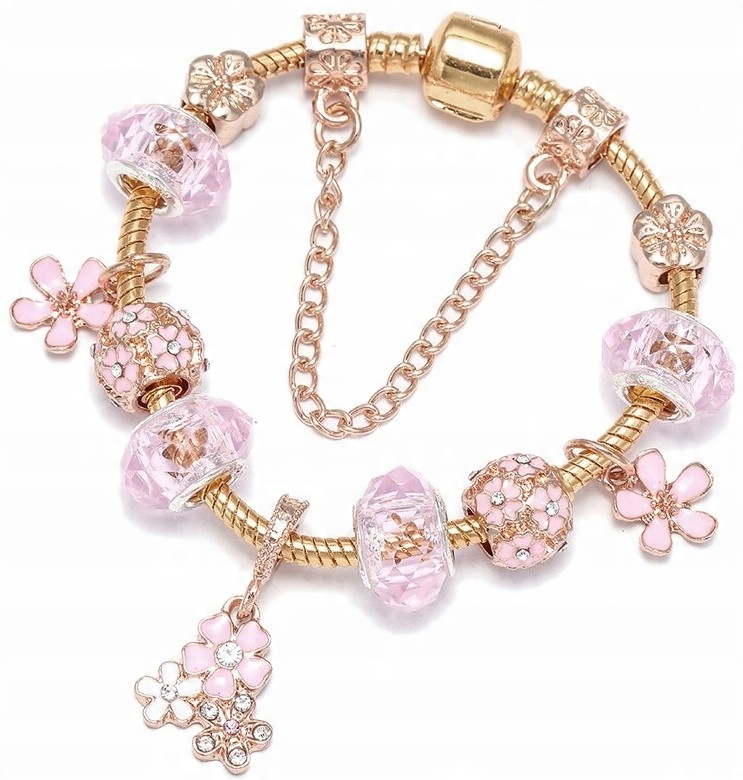 

Złota Bransoletka modułowa Różowe charmsy Beads