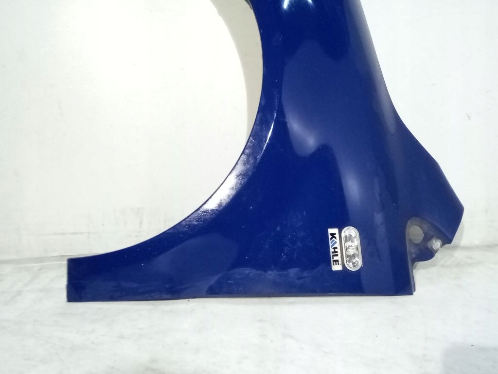 VW Fox blatník levý