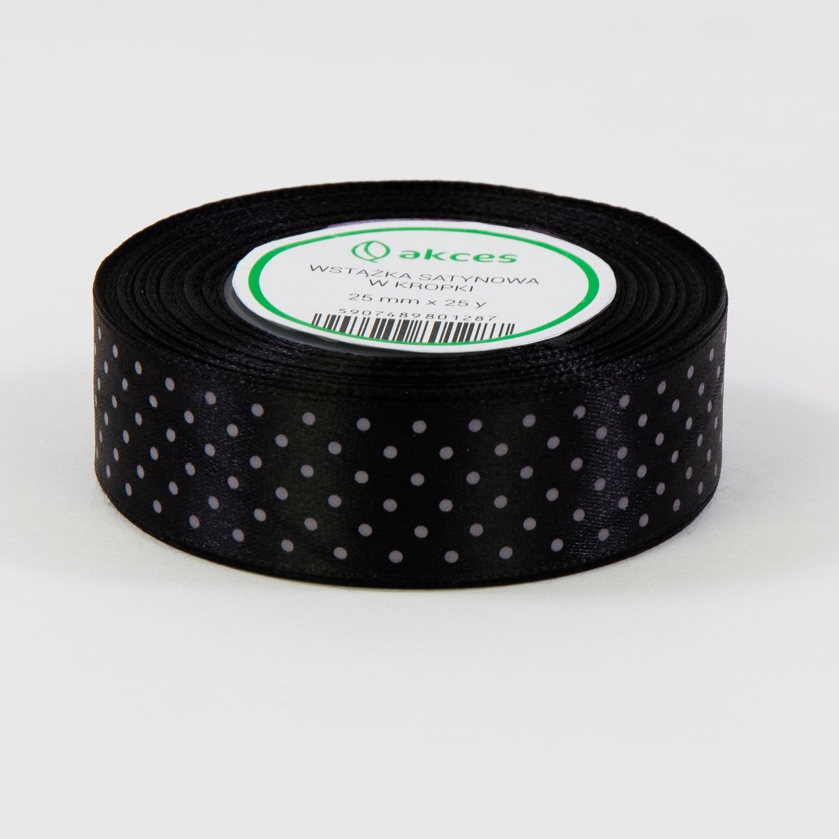 

Czarna tasiemka satynowa w kropki 25mm 22m