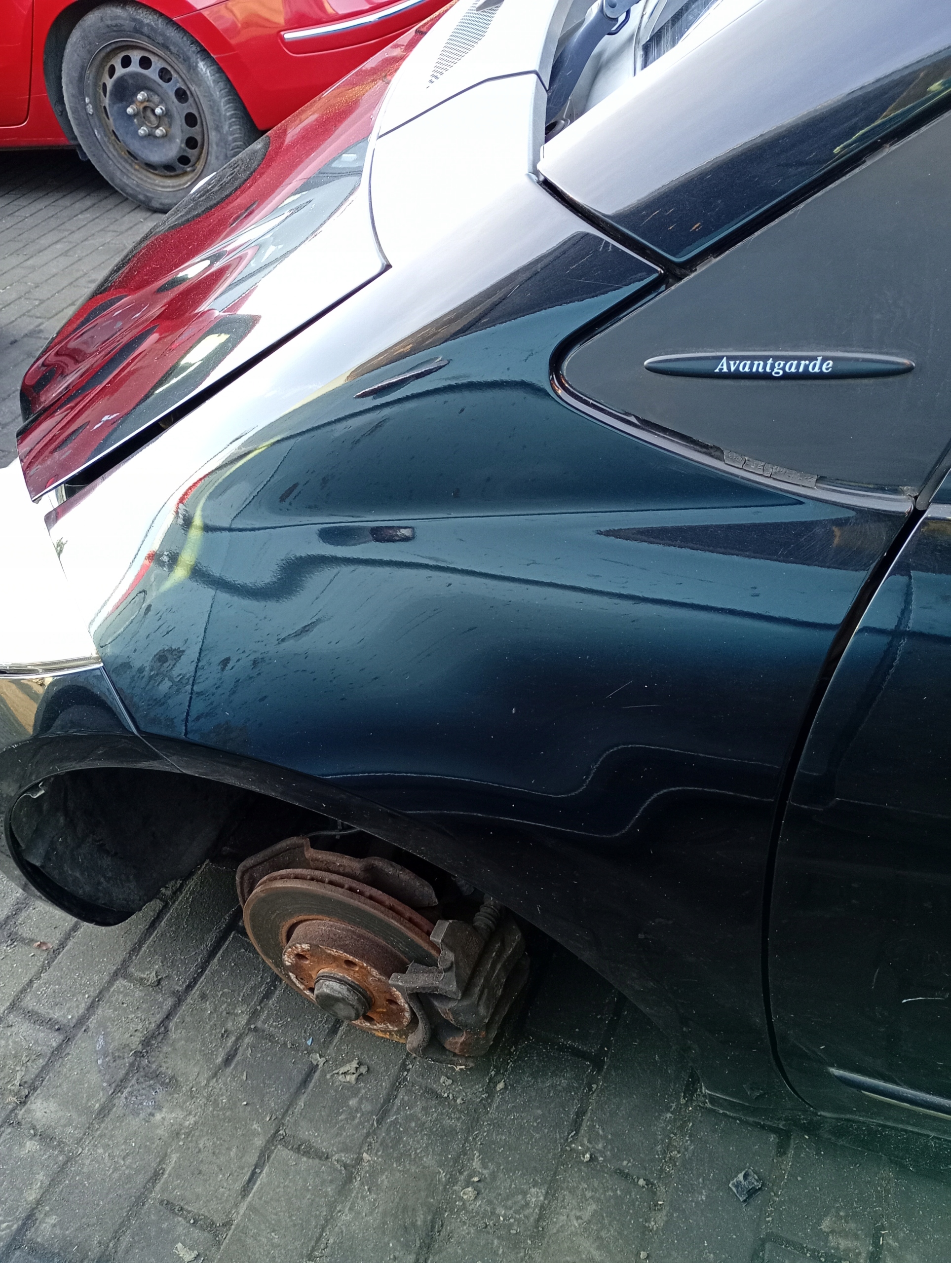 Mercedes A-KLASA W169 04-12 fender left front front kod lakieru 191