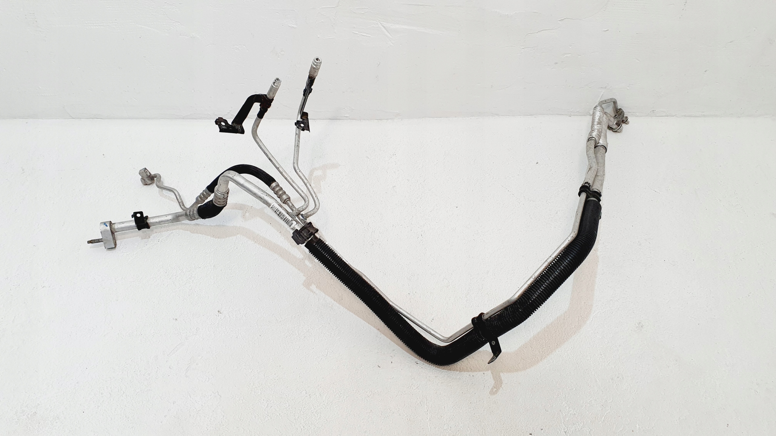 BK2119A834AG - ТРУБКА КОНДИЦИОНЕРА FORD TRANSIT CUSTOM