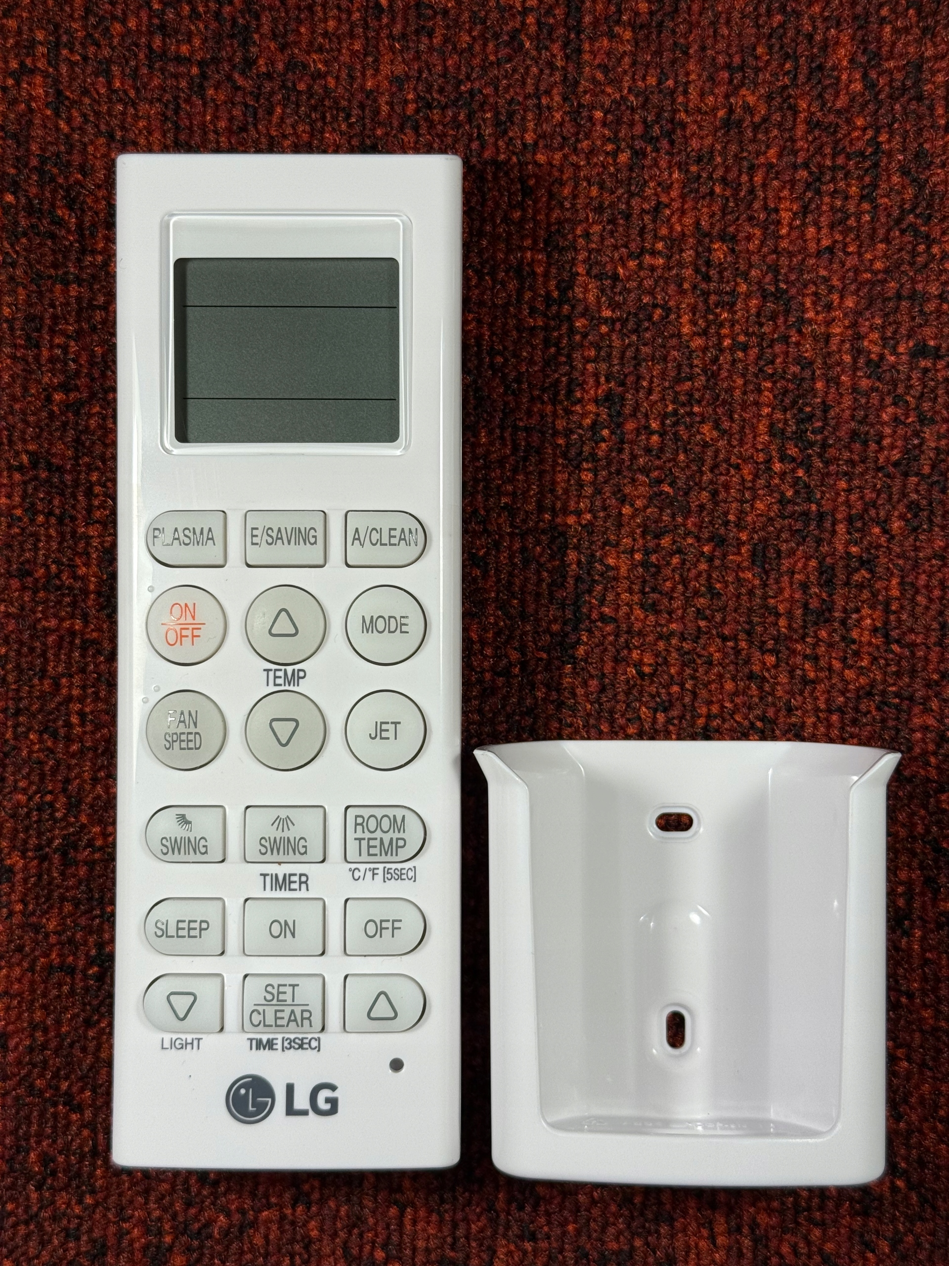 Pilot klimatizácie Lg s držiakom na stenu