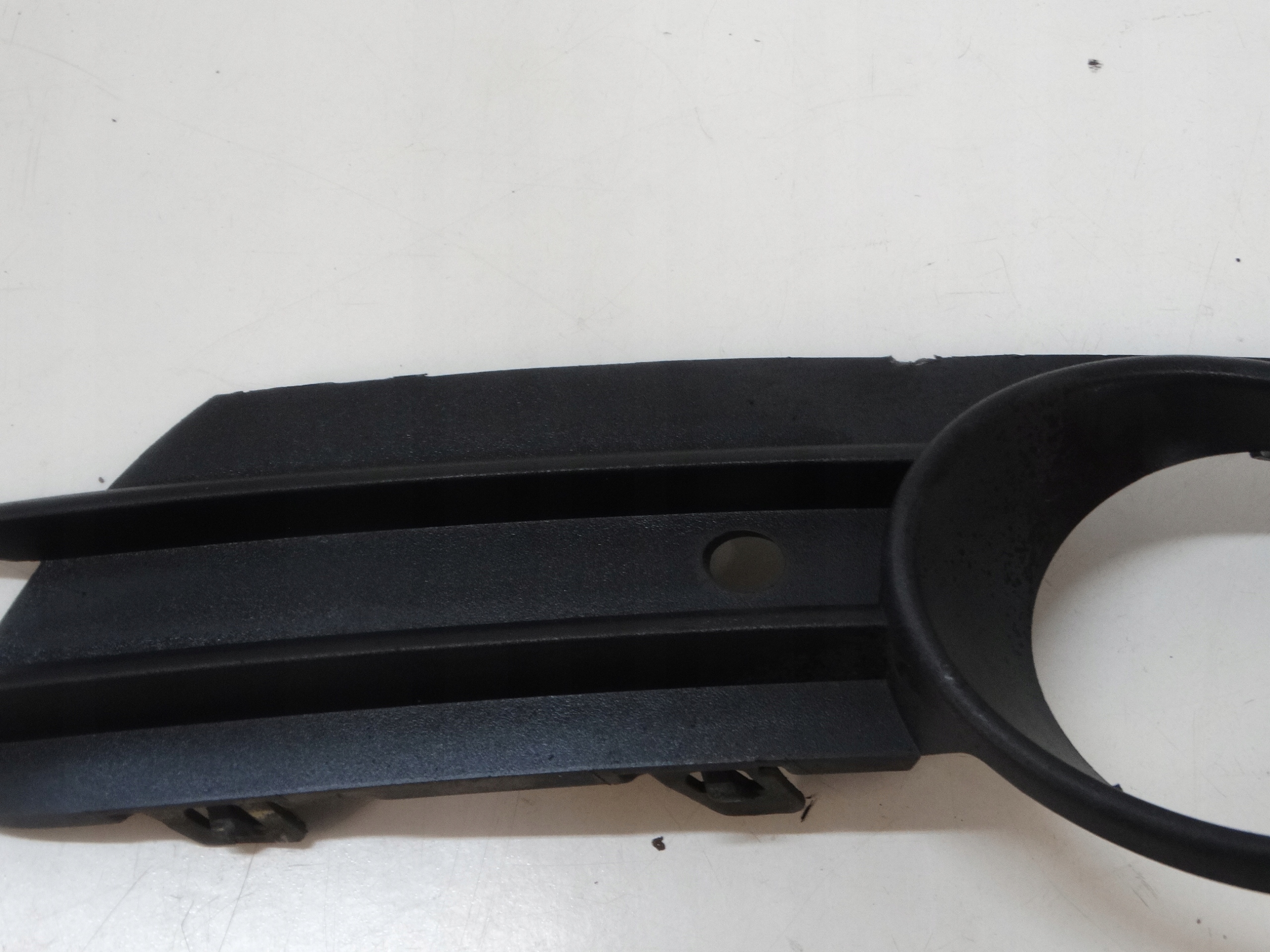 grid of a bumper left front OPEL CORSA D 13211478
