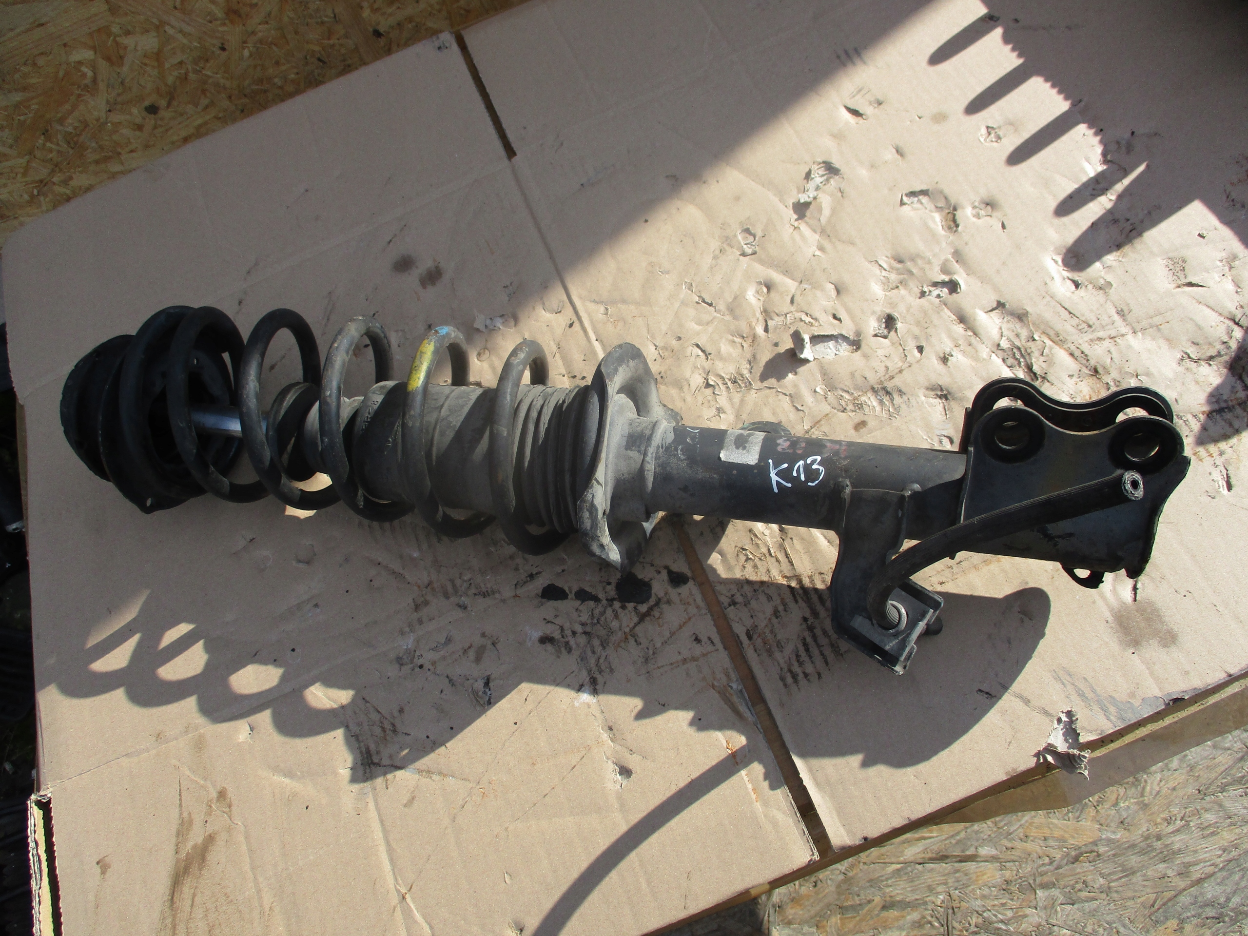 shock absorber front left Nissan Micra K13 10-16