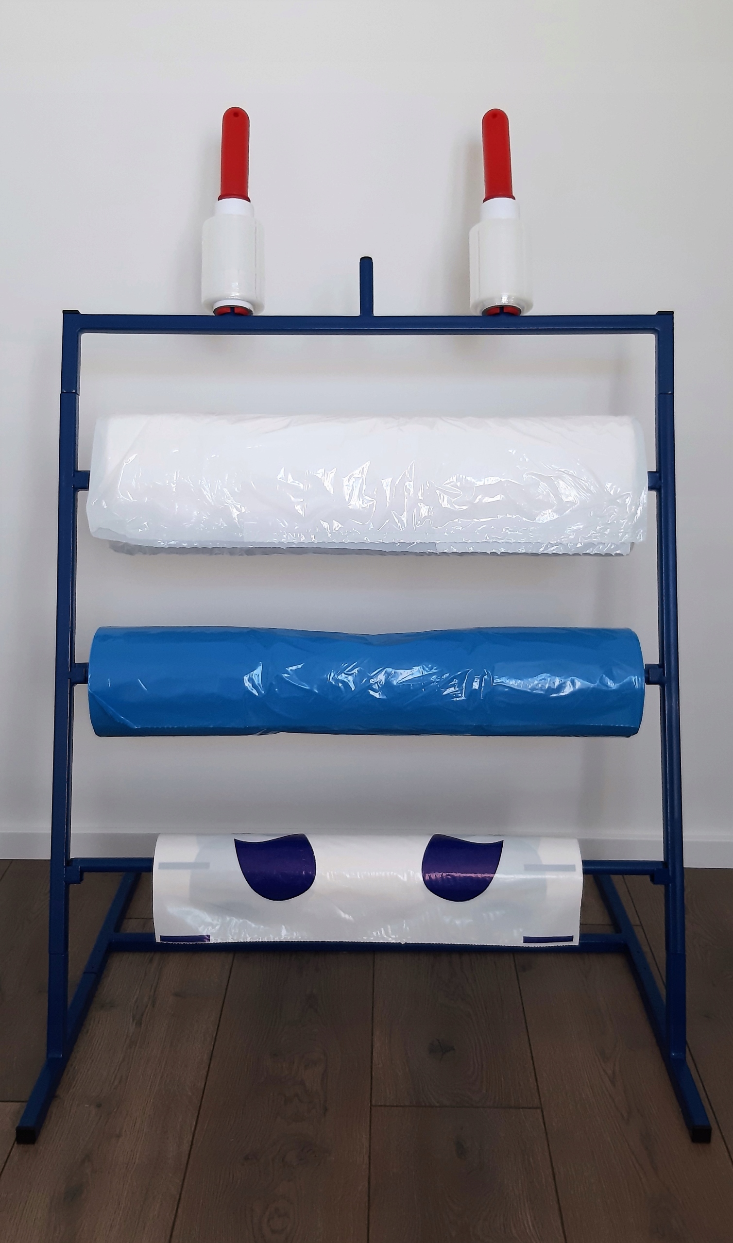 Stojan na ochranné fólie, poťahy na sedadlo, koberčeky, vrecia, volant