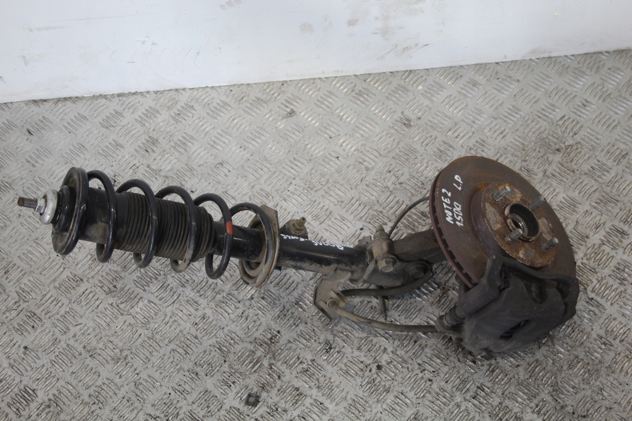 swing McPherson left front NISSAN NOTE II 2 E12