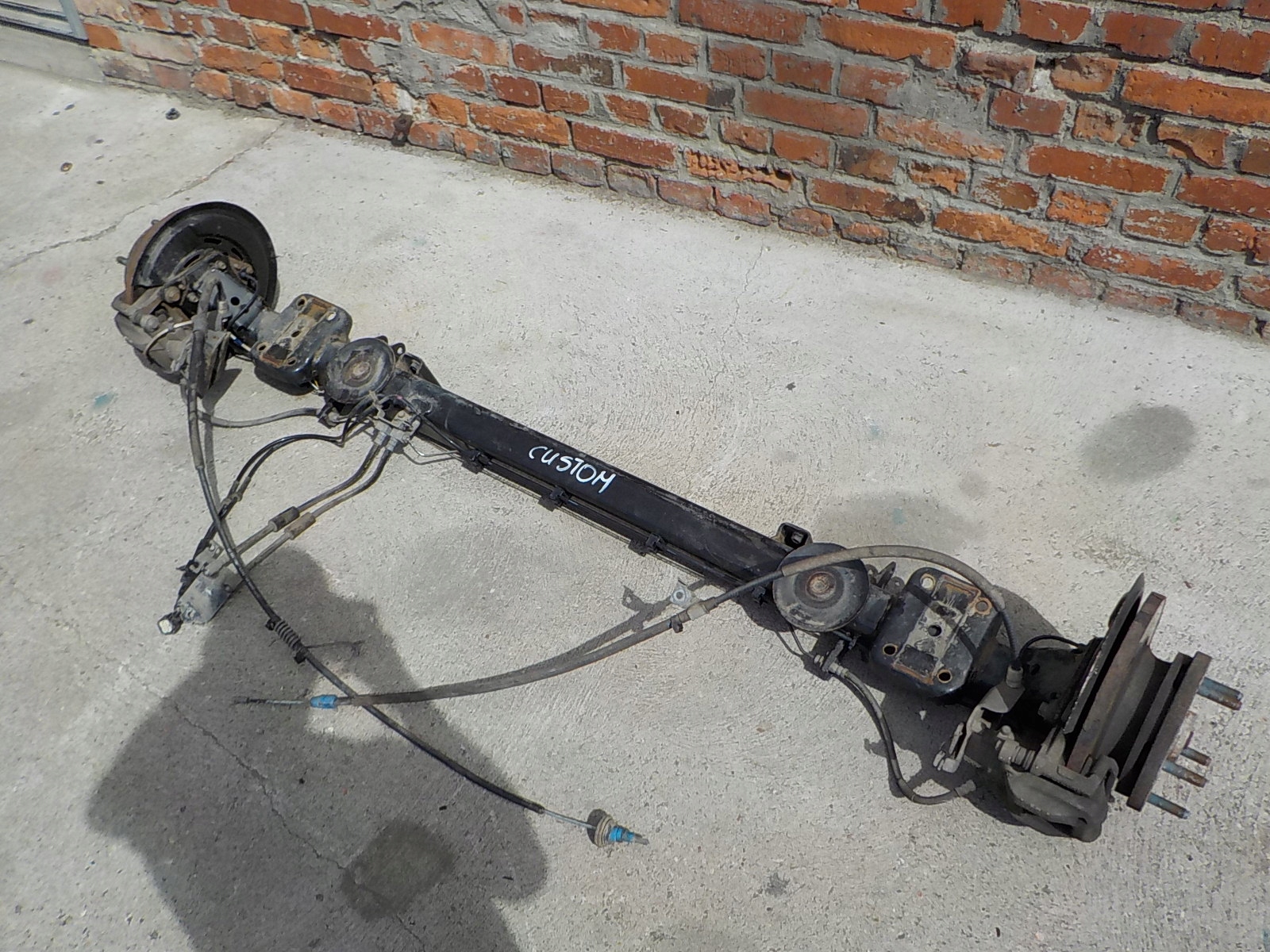 FORD TRANSIT CUSTOM 12-19 OŚ BELKA ZAWIESZENIA TYŁ Producent części Ford OE