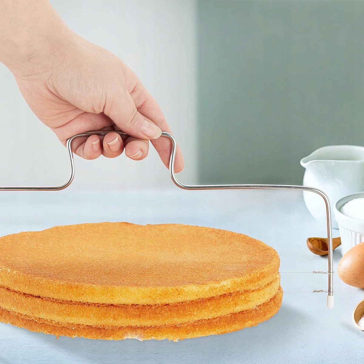 NÓŻ STRUNOWY DO CIĘCIA BISZKOPTU CIASTA DUŻY Kolor dominujący srebrny