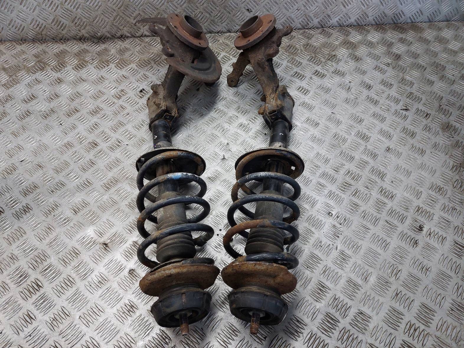shock absorber spring swing left front + right front DACIA LOGAN and