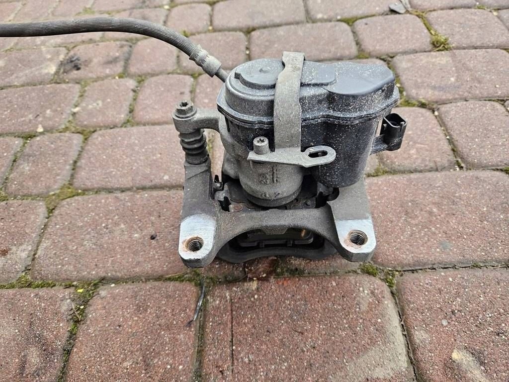 caliper rear part rear left zaciskowy jazmo 4x4 Opel Insignia B