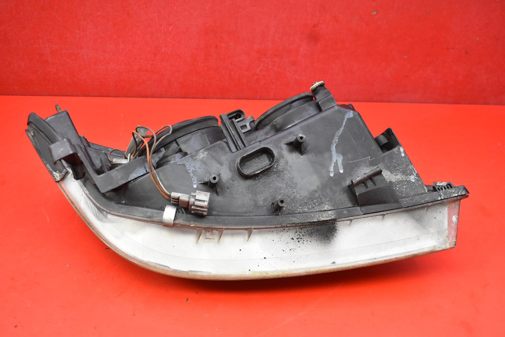 REFLEKTOR left light front EU NISSAN PRIMERA P12 01-08
