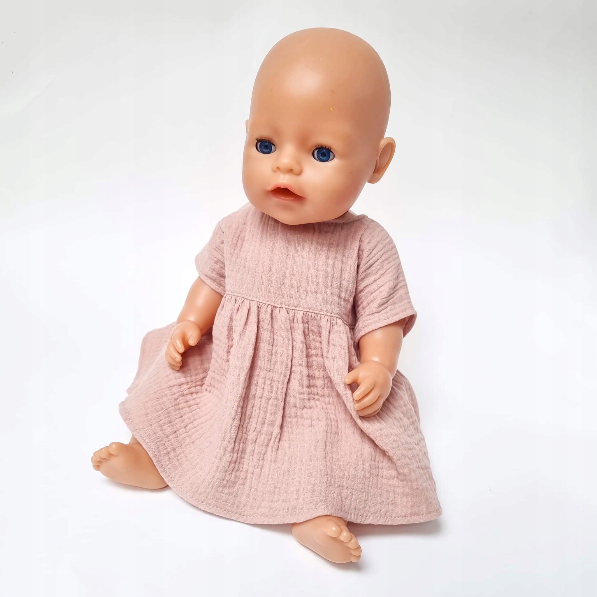 

Sukienka muślinowa dla lalki Baby Born 43cm różowa