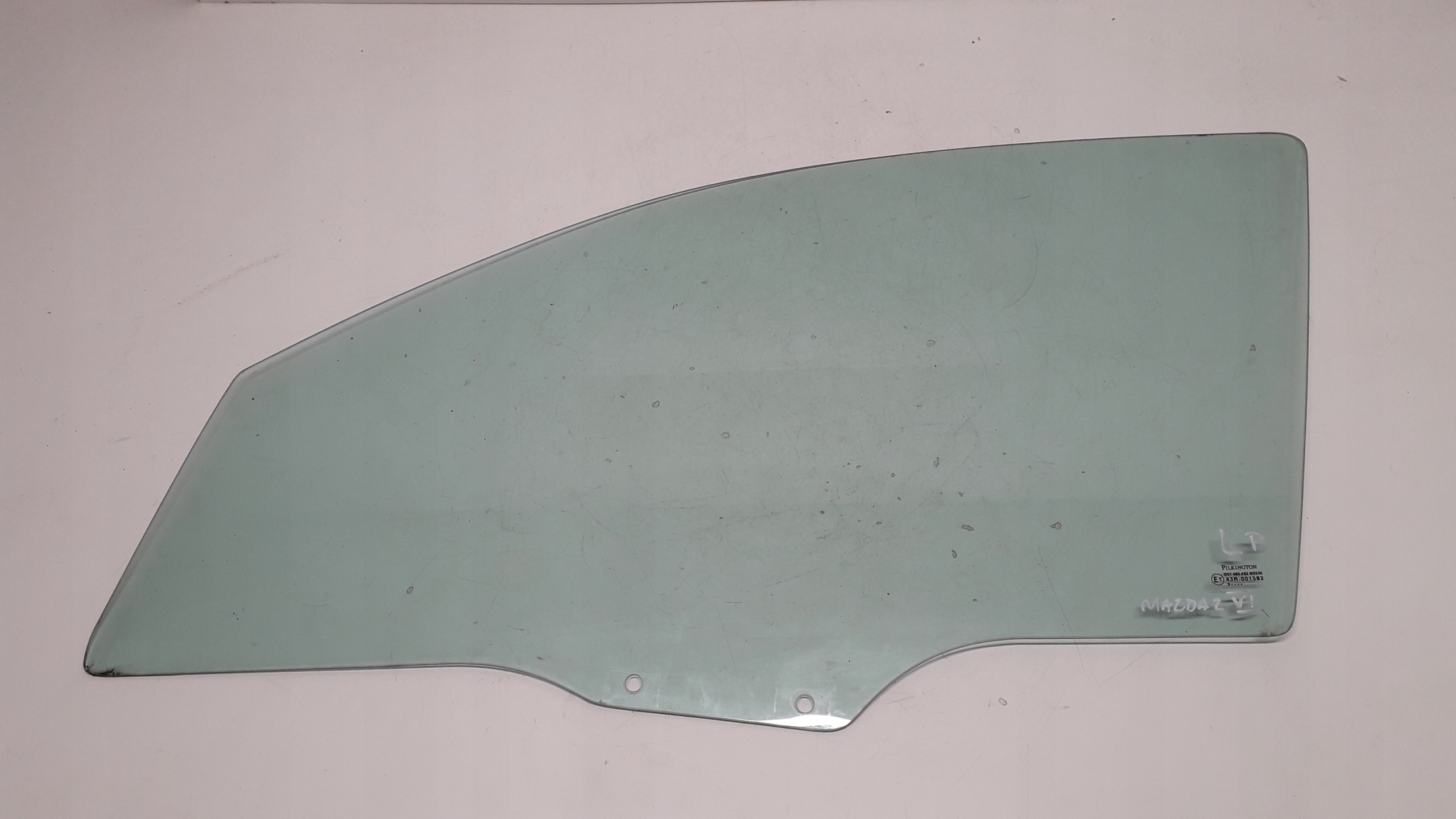 MAZDA 2 II 02-07 SZYBA Z DRZWI LEWY PRZÓD