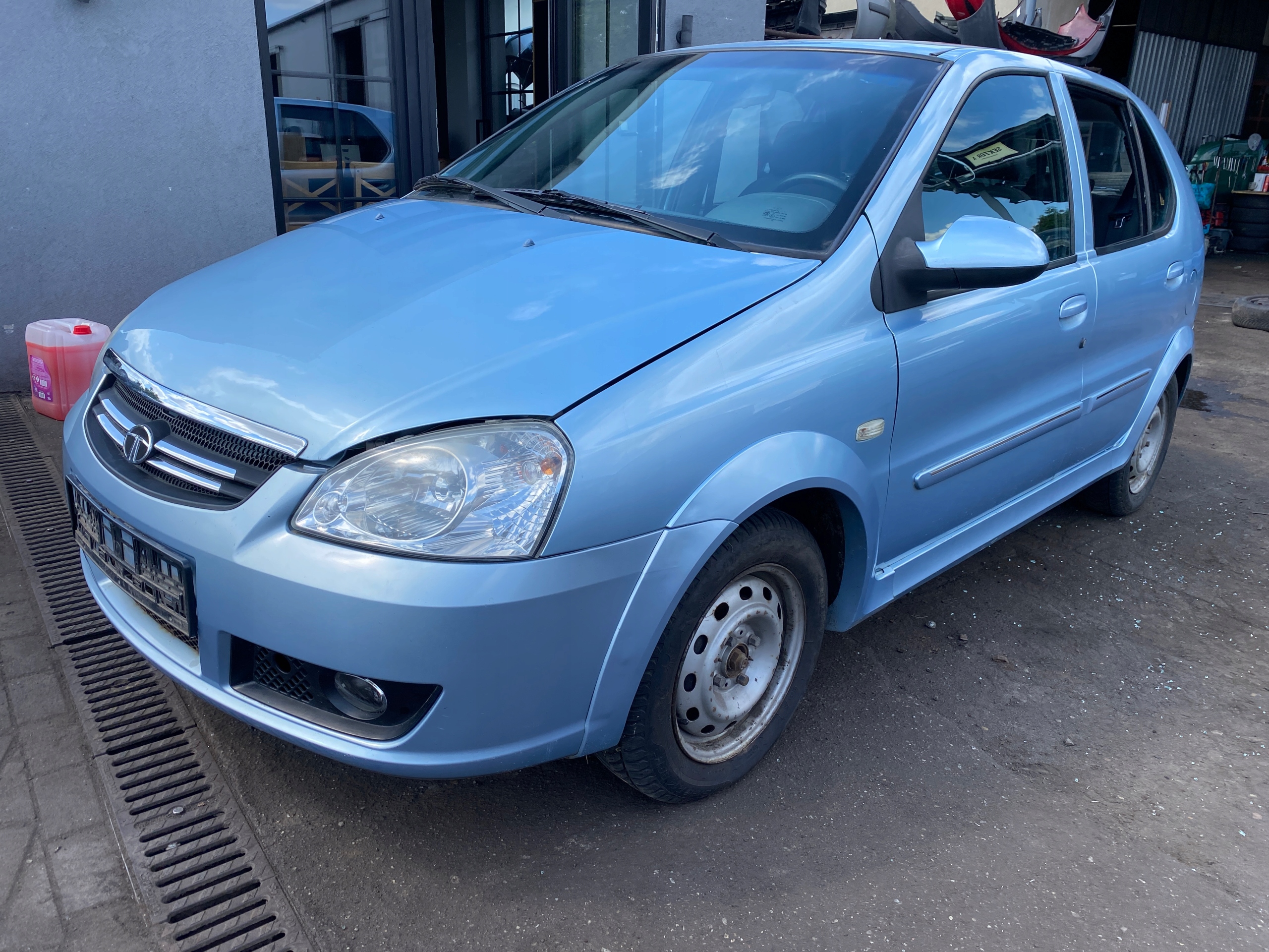 dveře levé zadní záď Tata Indica FL 08-10 kód lakieru TAT551