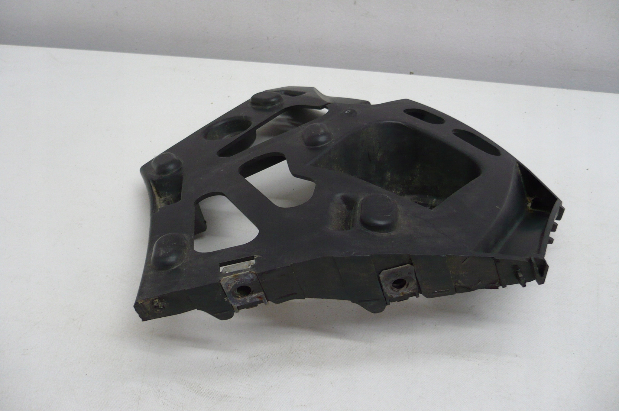 PEUGEOT 207 holder bumper bracket left front 06-12