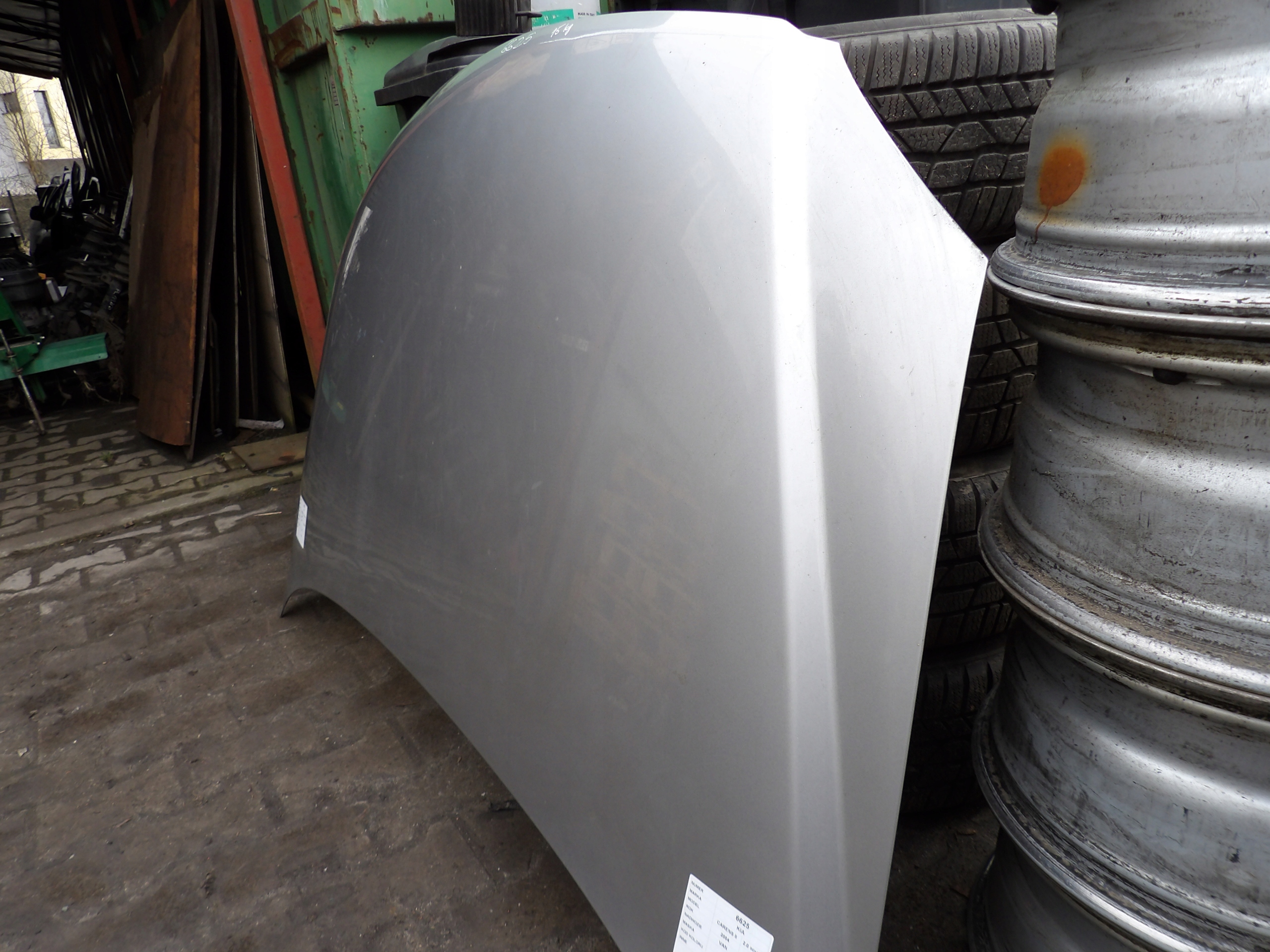 Kia Carens II bonnet lak. C5