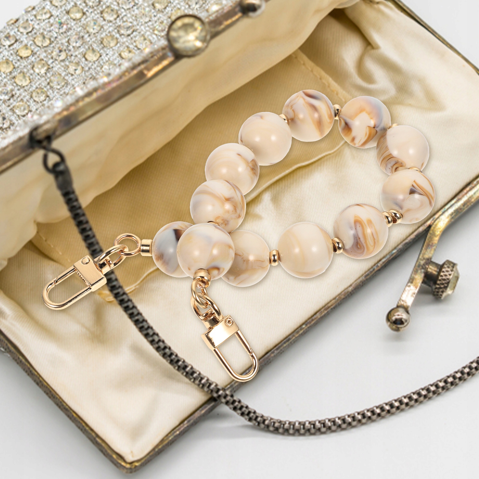 Torebka z łańcuszkiem. Złote paski. Torebki. Marka Inna marka